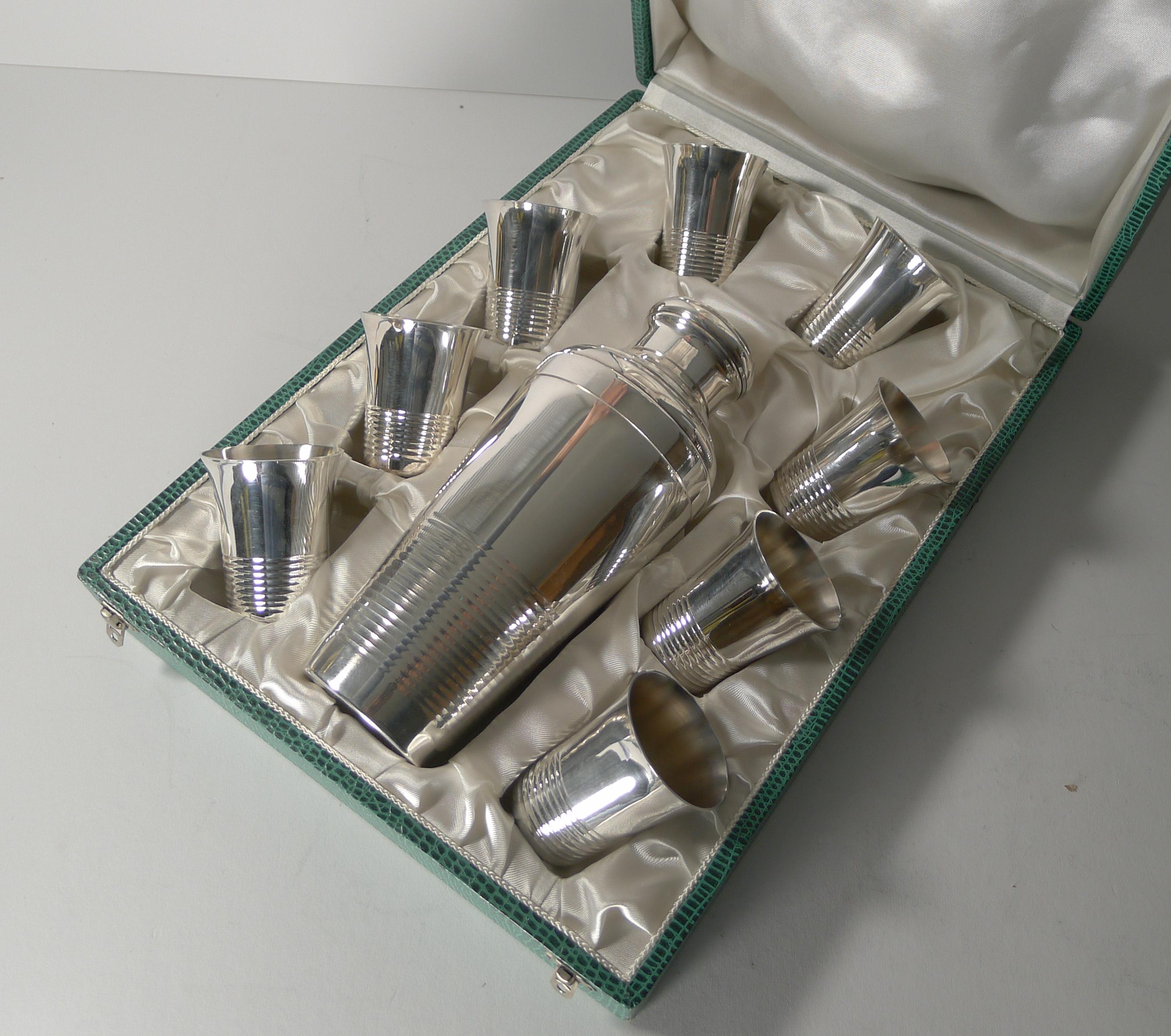 A handsome cased cocktail set made from French silver plate, each piece signed on the underside 