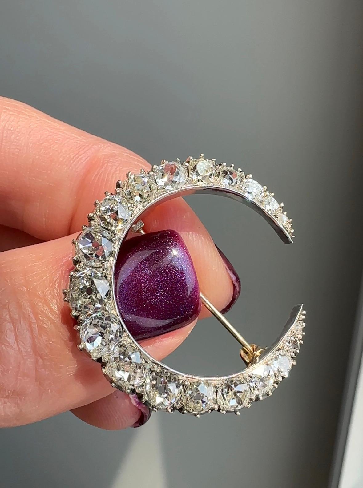 Complete with the original fitted box from R. Stewart in Glasgow, this romantic late 19th century crescent brooch is lined with a graduated course of 4.35 carats in glittering old mine-cut and rose-cut diamonds, masterfully hand fabricated in silver