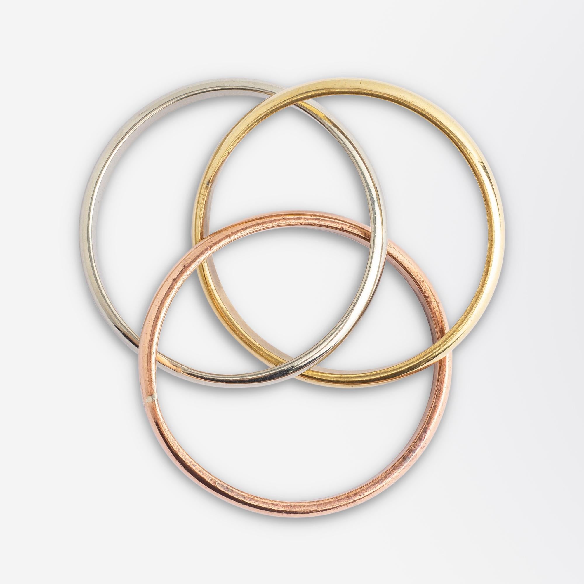 Set von 4 Cartier 'Trinity' Serviettenringen in Schachtel im Zustand „Gut“ in Brisbane City, QLD