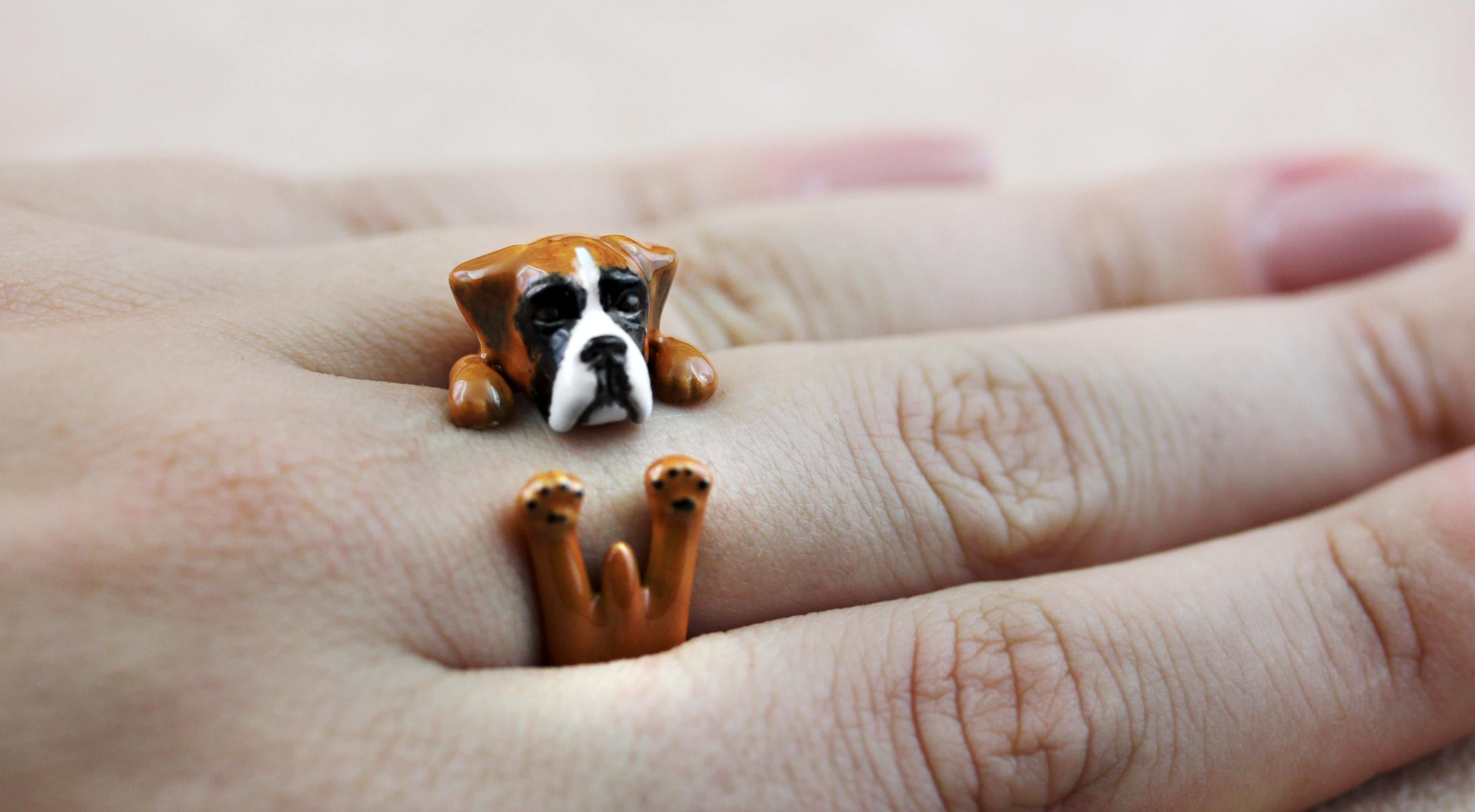Ring made in sterling silver 925 featuring a Boxer, thanks to amazing hand enamel life-like features is vividly rendered.   

The AVGVSTA Dog ring is hand made and 100% customizable.  
We offer free engraving-perfect for dog's name or the owner of