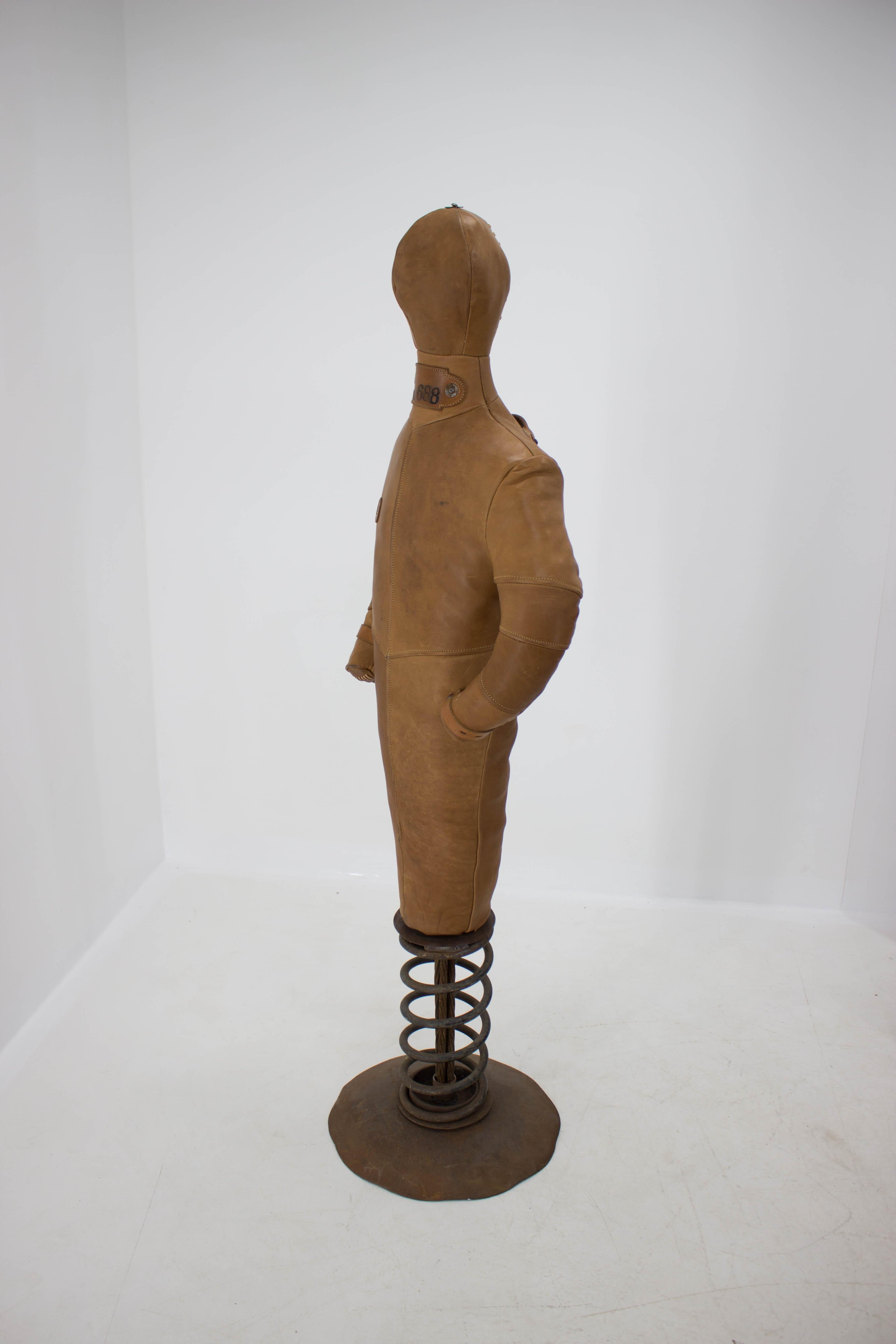 Leather punching dummy on a heavy metal stand. Handmade in Czech Republic. Very good condition - no deffects.