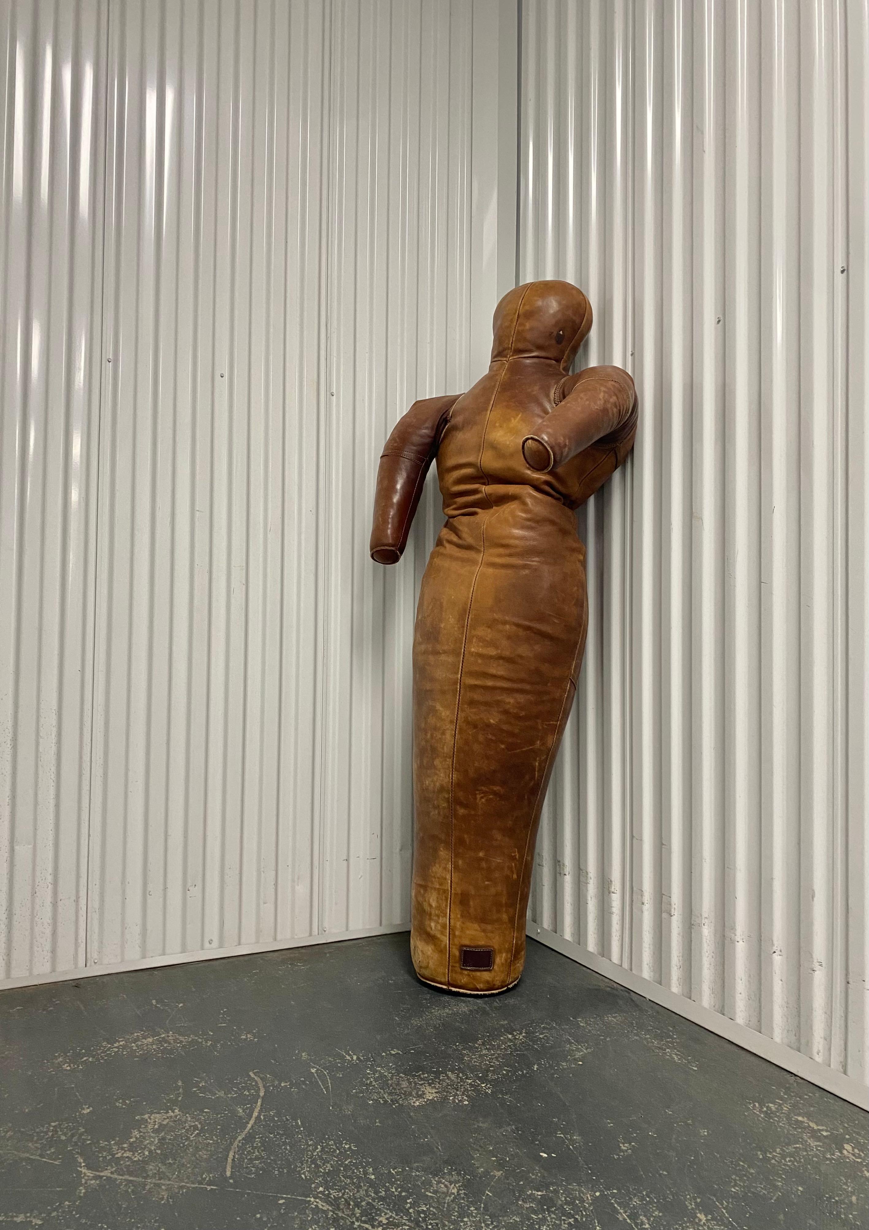 European “throwing dummy”. These incredible works of art were made in Austria, Germany, The Netherlands and France in the early part of the 20th Century. Constructed of sewn and stitched brown leather.

Dimensions:
25”W x 18”D x 61”H

This is a