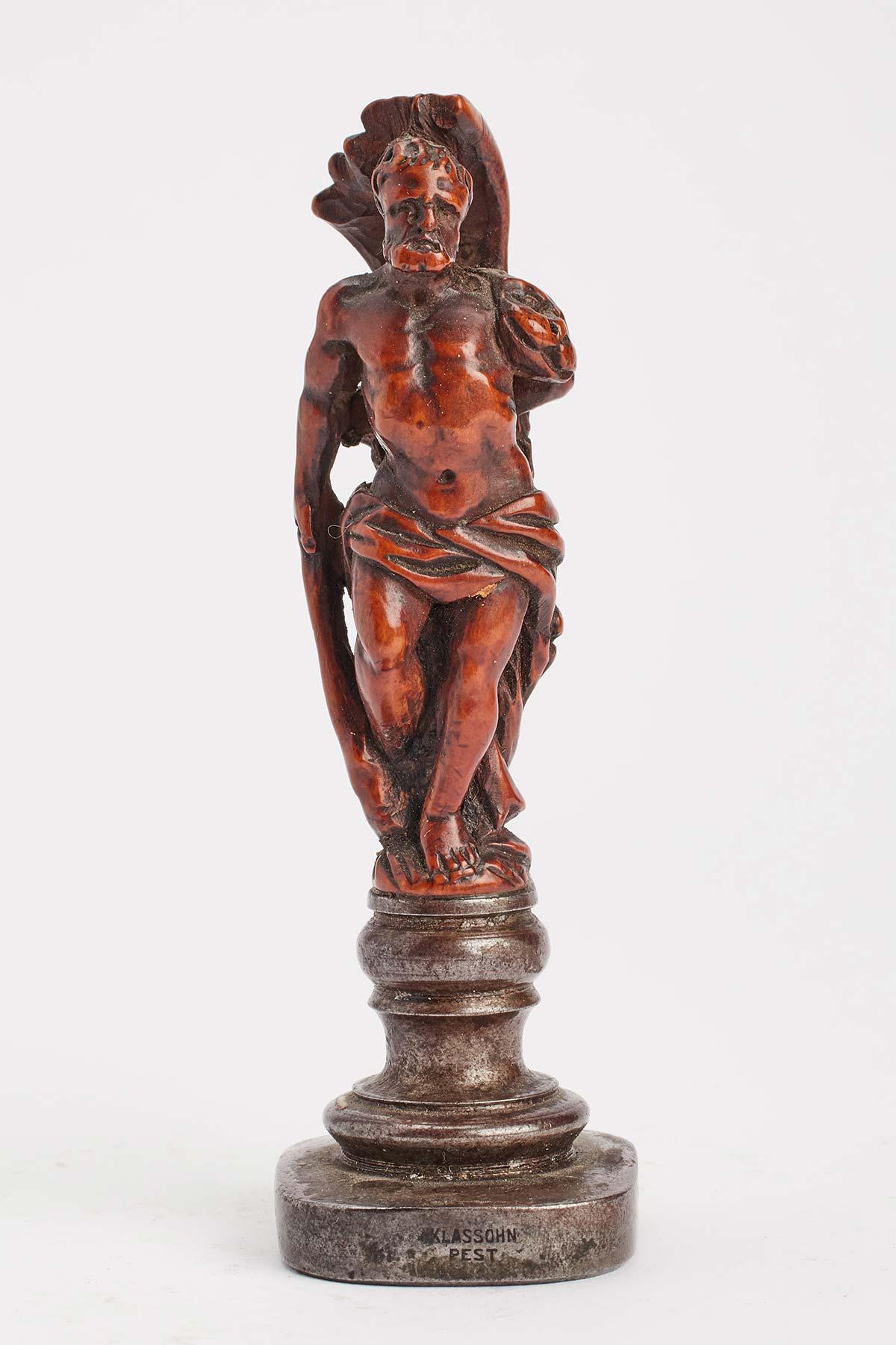 Un sigillo Grand Tour in legno di bosso intagliato che raffigura Ercole con una matrice quadrata in ferro. Italia, metà del XVIII secolo.