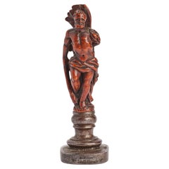 Sello tallado en madera de boj que representa a Hércules, Italia, siglo XVIII.