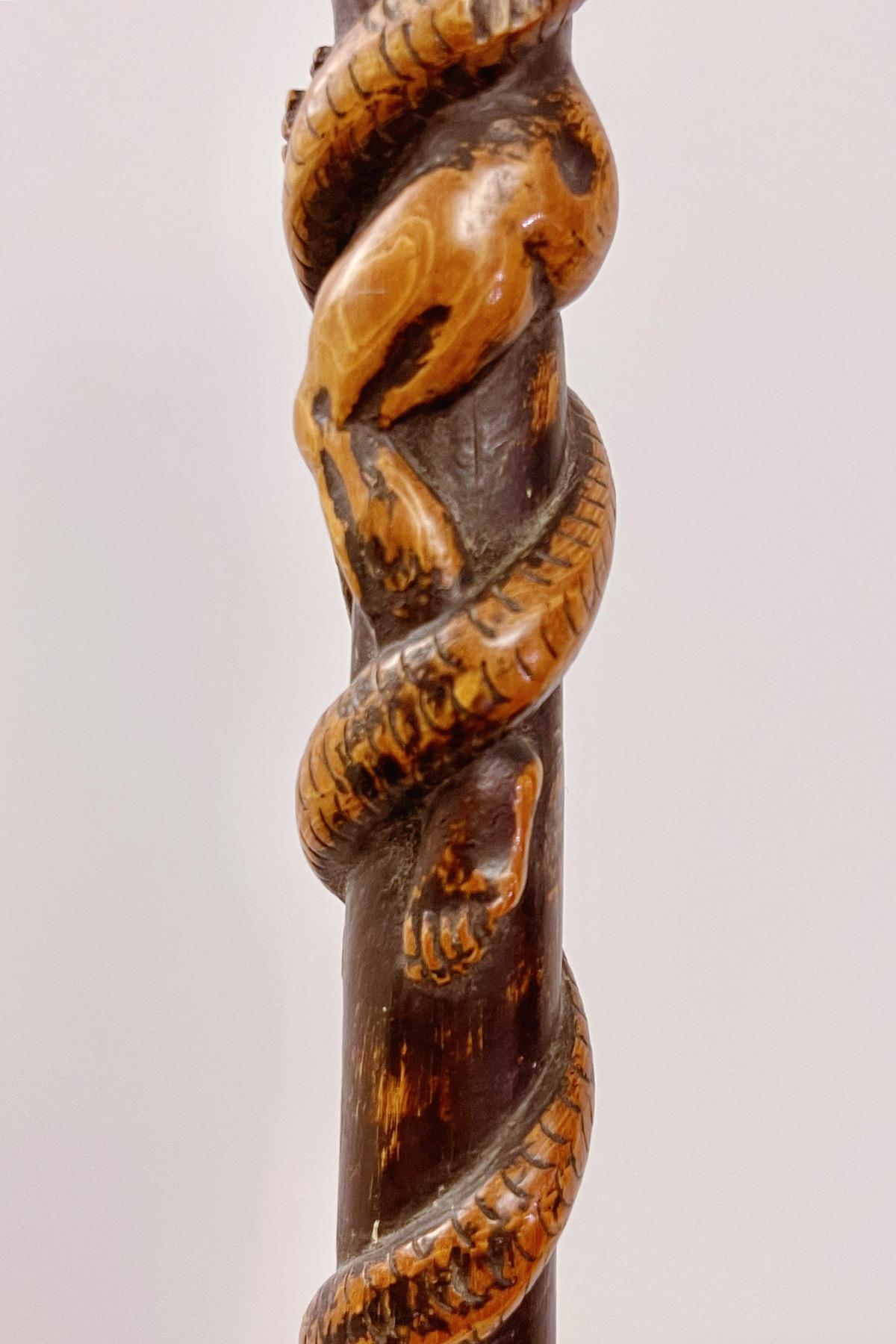 Boxwood folk art stick depicting a man with snake and lizard, Italy 1850.  For Sale 5