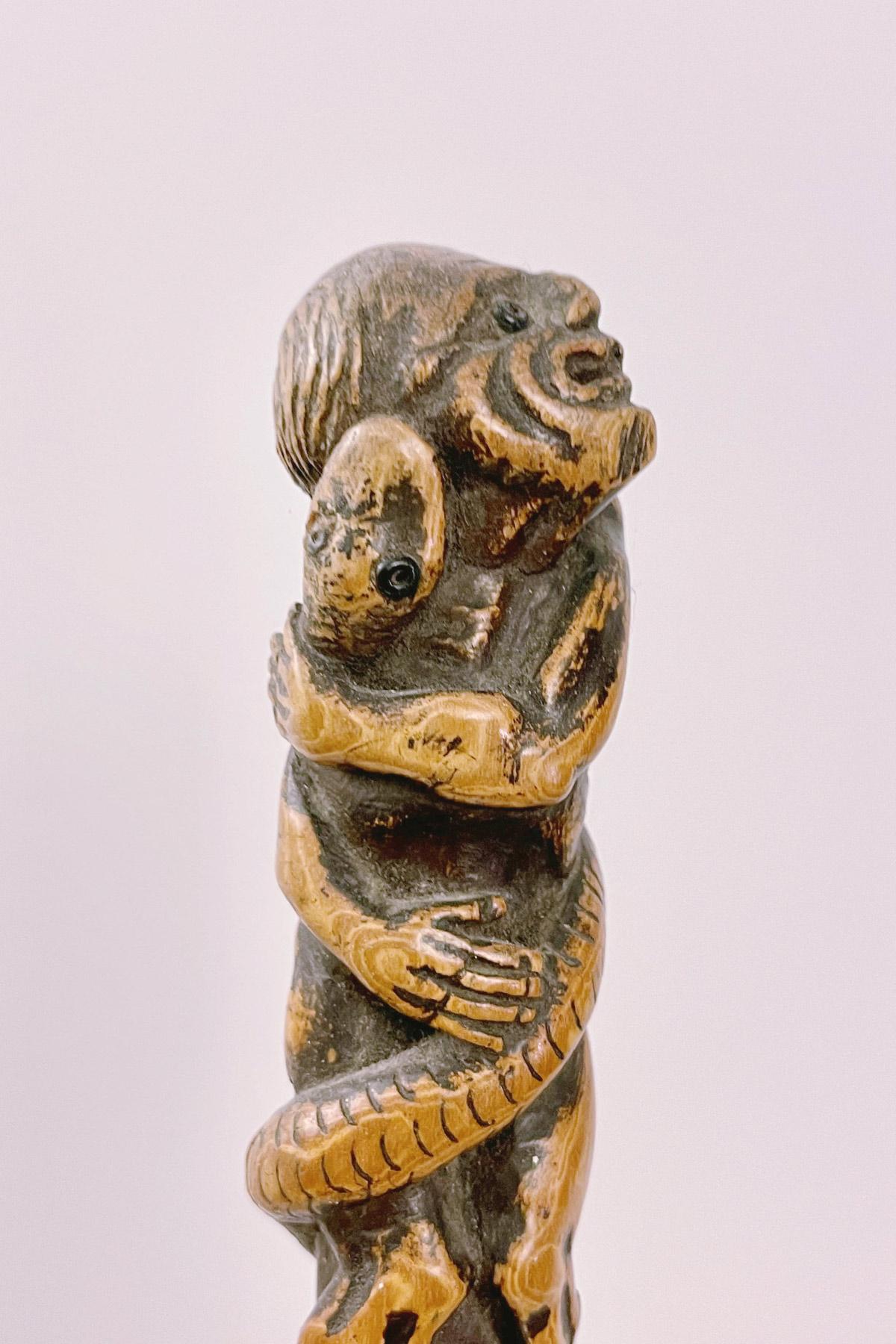 Boxwood folk art stick depicting a man with snake and lizard, Italy 1850.  For Sale 6