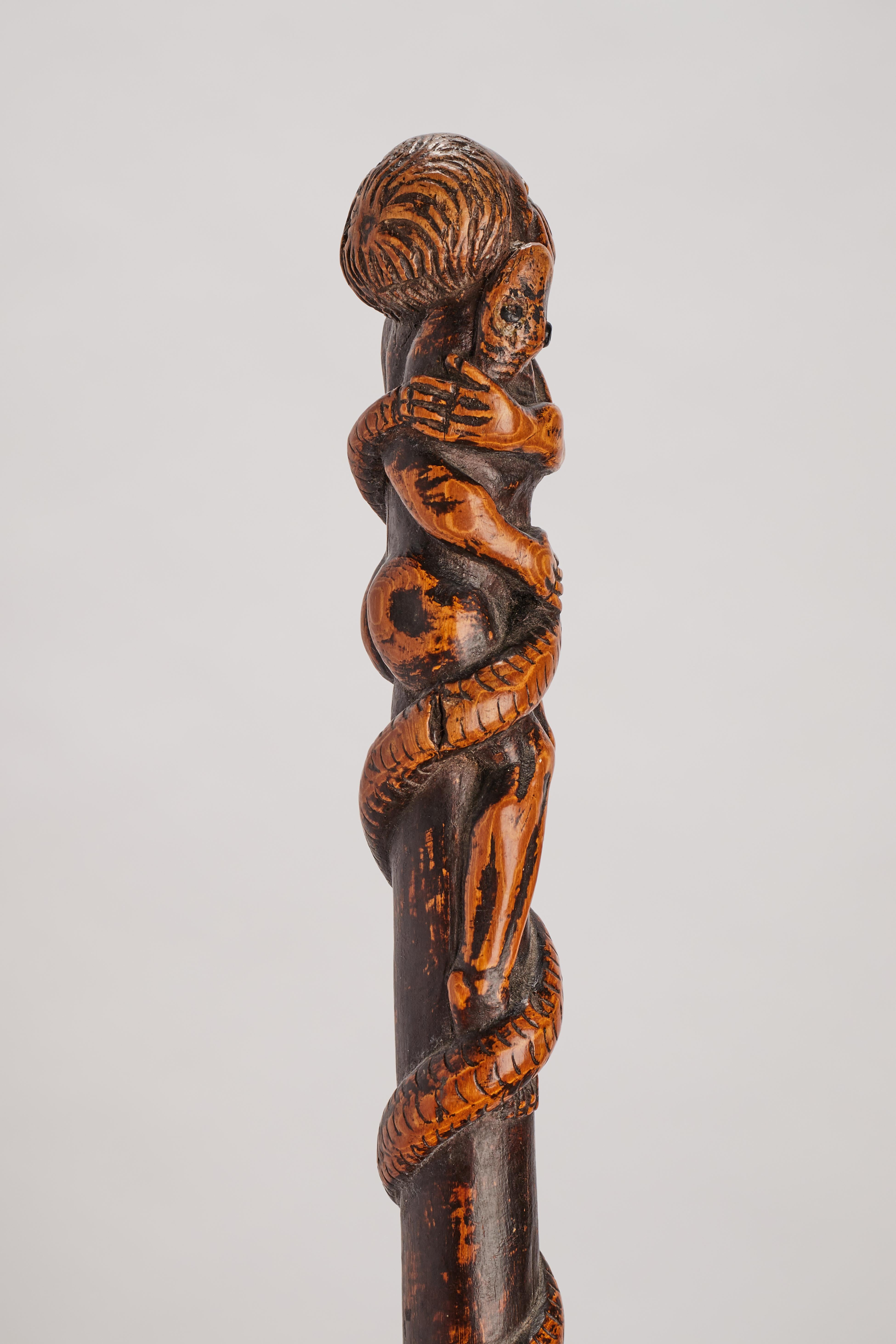 Boxwood folk art stick depicting a man with snake and lizard, Italy 1850.  For Sale 3