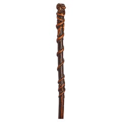 Antique Boxwood folk art stick depicting a man with snake and lizard, Italy 1850. 