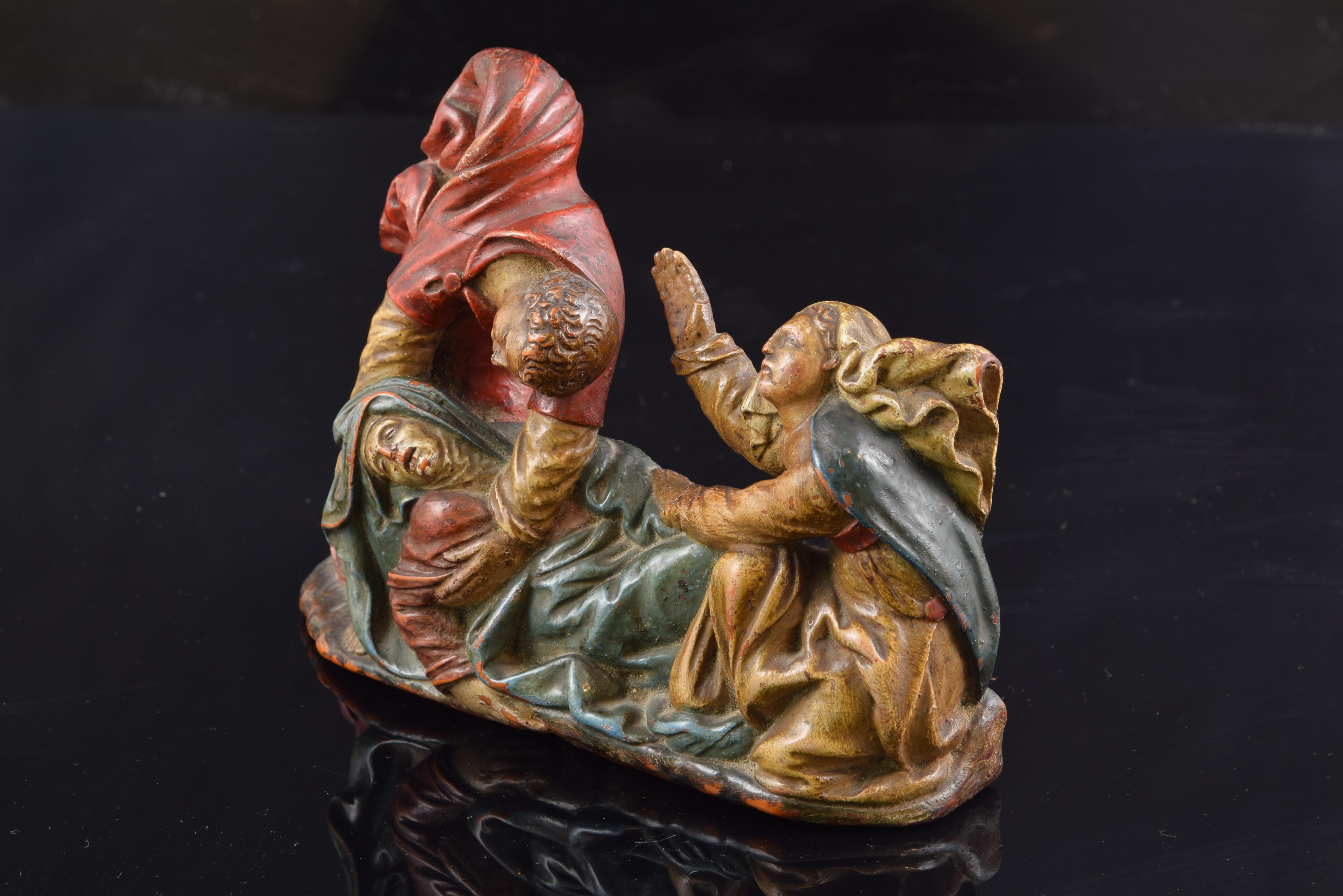 Sculptural ensemble. Polychrome boxwood. Spanishschool, 16th century. 
Polychrome boxwood carving showing a fragment ofa Catholic religious scene with three charactersdressed in robes and cloaks. In the lower area, lyingdown and passed out, is the