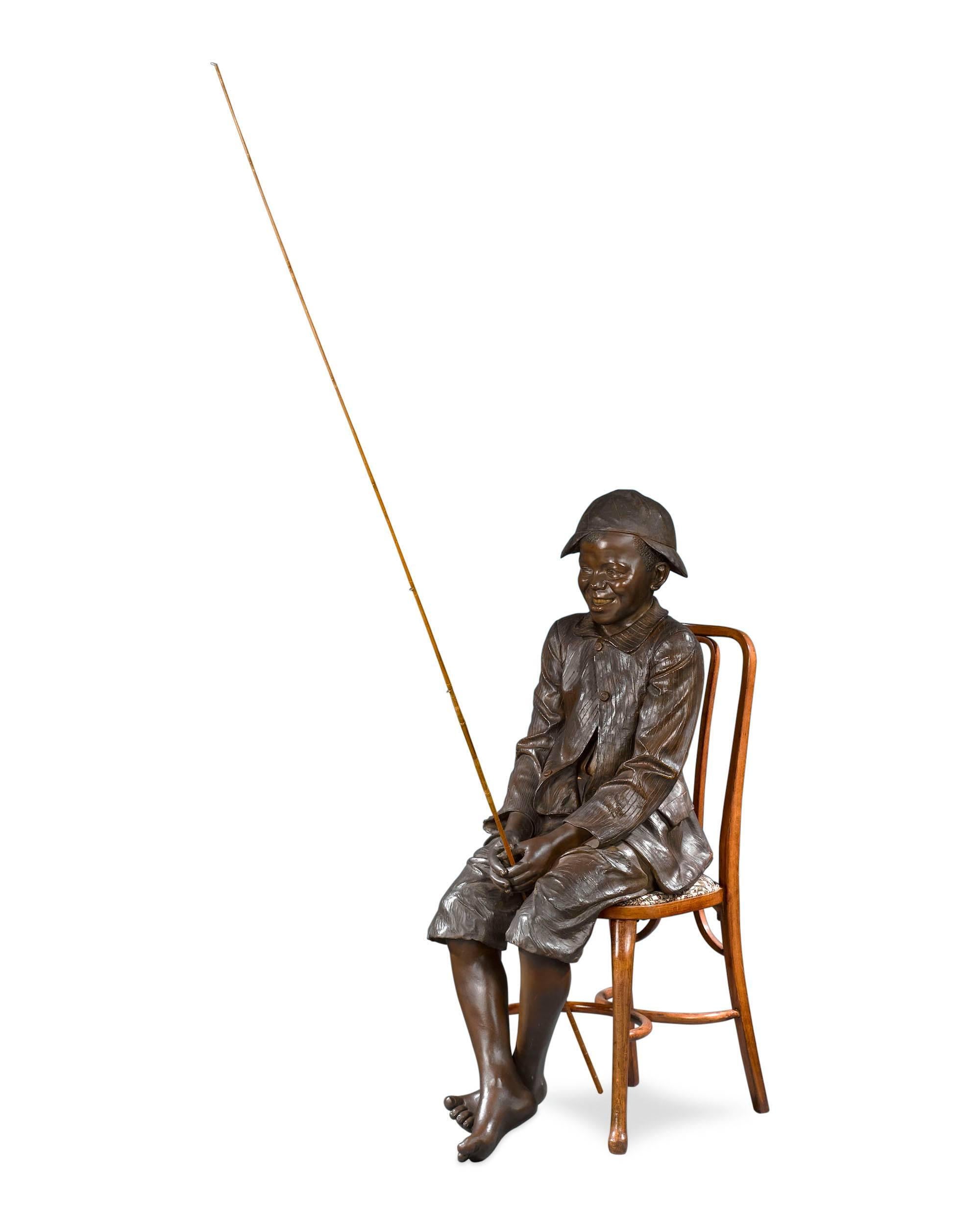 vintage fishing boy statue