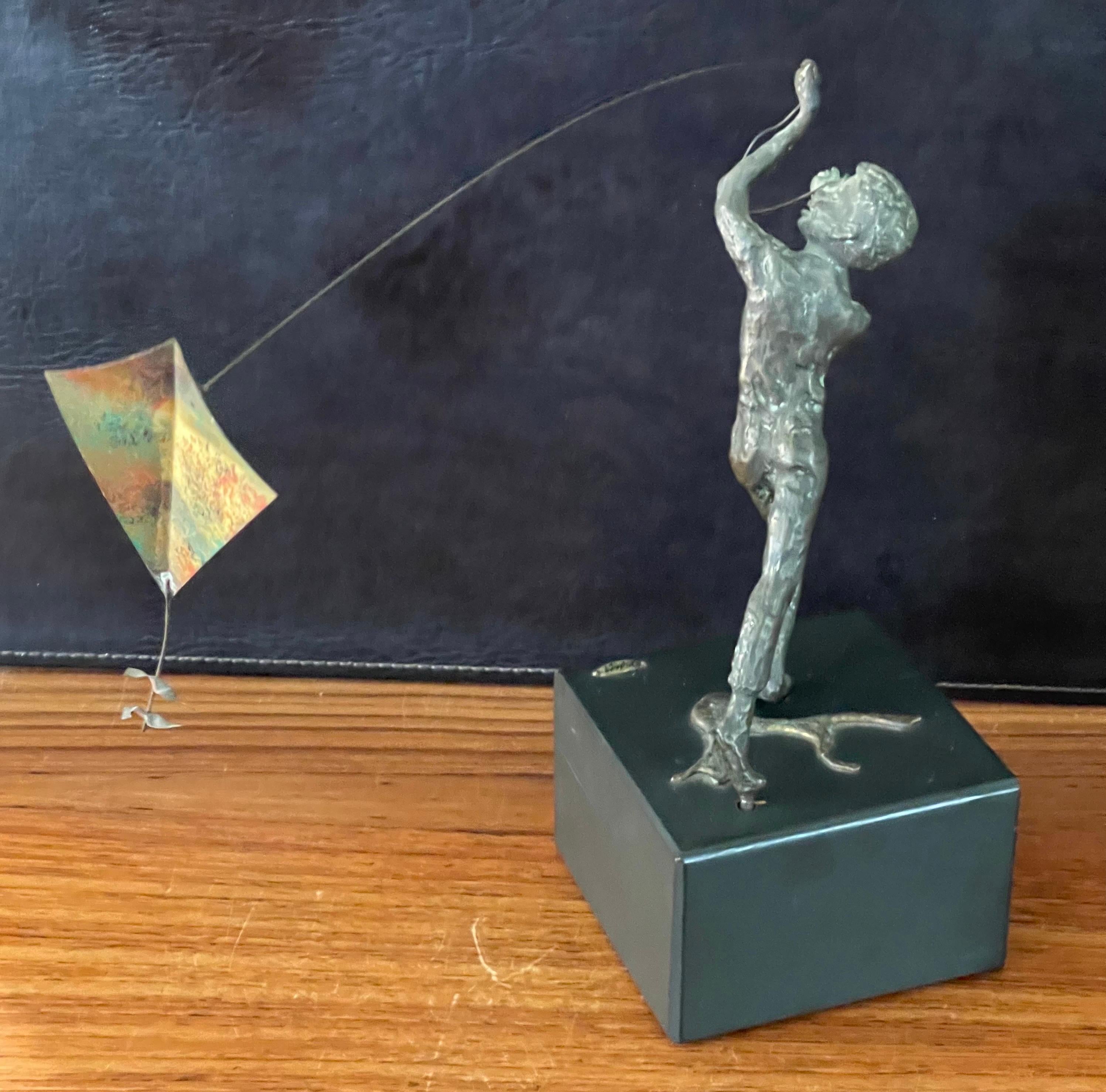 American Boy Flying Kite Bronze on Wood Block Sculpture by Curtis Jere For Sale