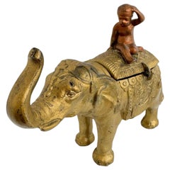 Boy on a Gilt Elephant Metal Money Box Piggy Bank, Antique Austria 1890s