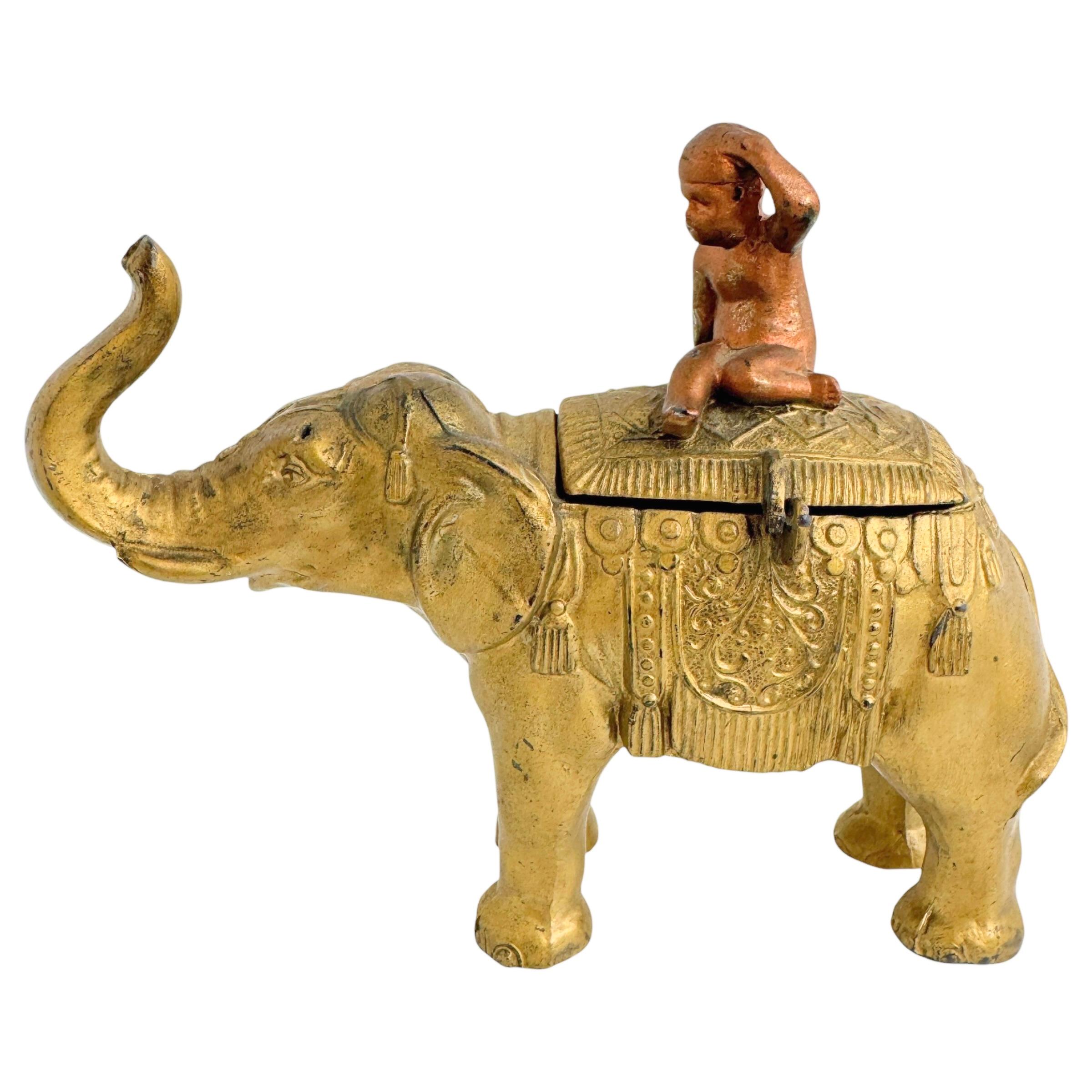Boy on a Gilt Elephant Metal Money Box Piggy Bank, Antique Austria 1890s