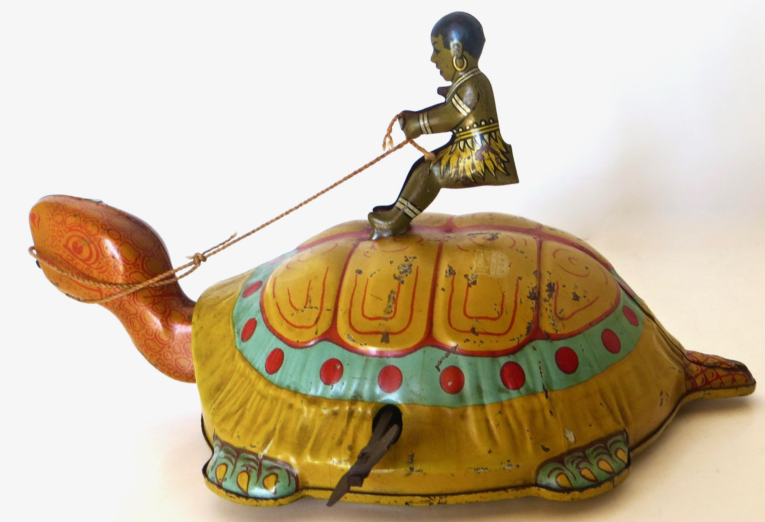 By J. Chein, circa 1930, this tin lithographed and hand painted American tin wind-up toy is all original and in working order. There are a few scratches here and there (from normal play and use); but for a nearly 100 year old toy, it is in very good