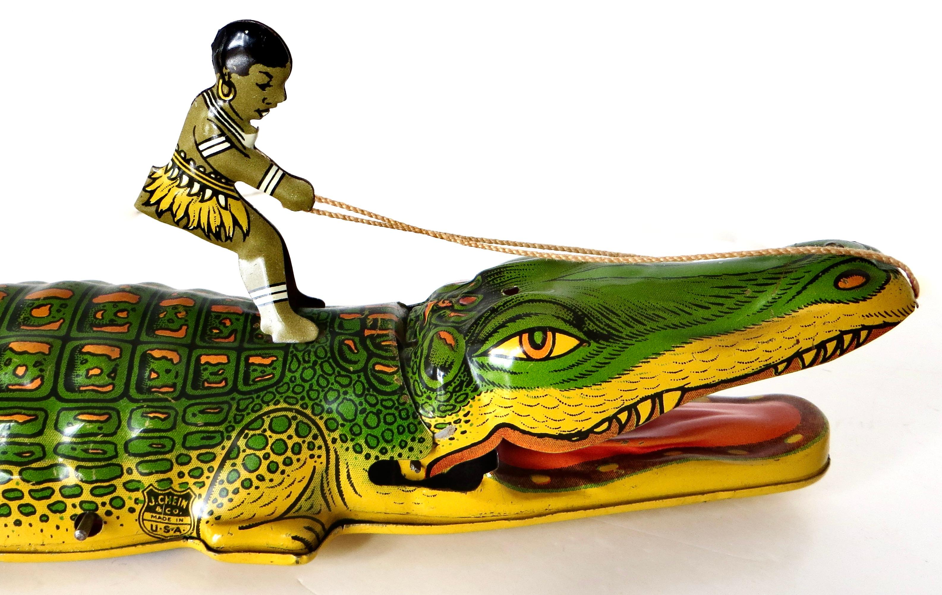 „Boy Riding An Alligator“ Vintage Wind-Up-Spielzeug von J. Chein Co., N.J., um 1935 (Volkskunst) im Angebot