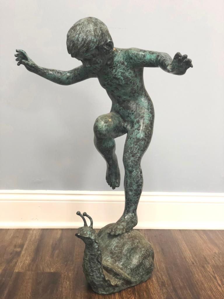 Boy Riding Snail Bronze Statue 1