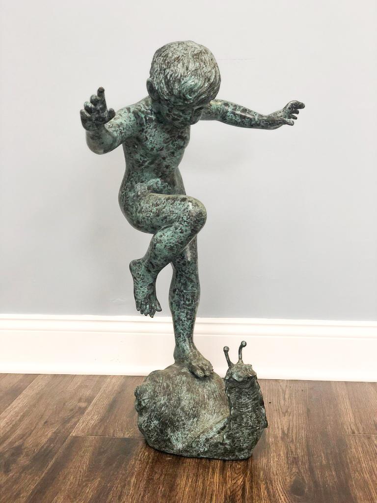 Boy Riding Snail Bronze Statue 3