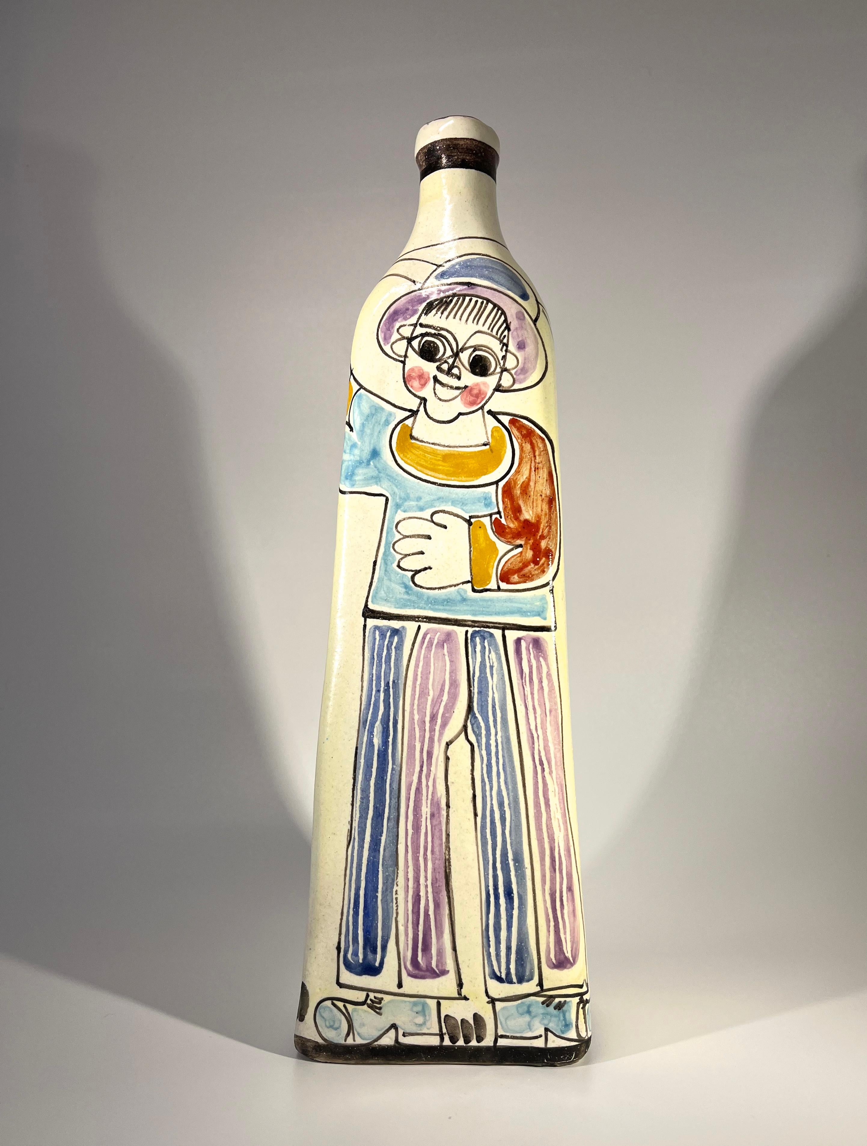 Jolly DeSimone 'Boy With Balloons' tall Italian ceramic bottle vase from the 1960's
Hand painted in typical entertaining DeSimone style
A 12 inch tall piece
Signed DeSimone Italy on the base
Circa 1960
Height 12 inch, Width 3.75 inch, Depth 2.5
In