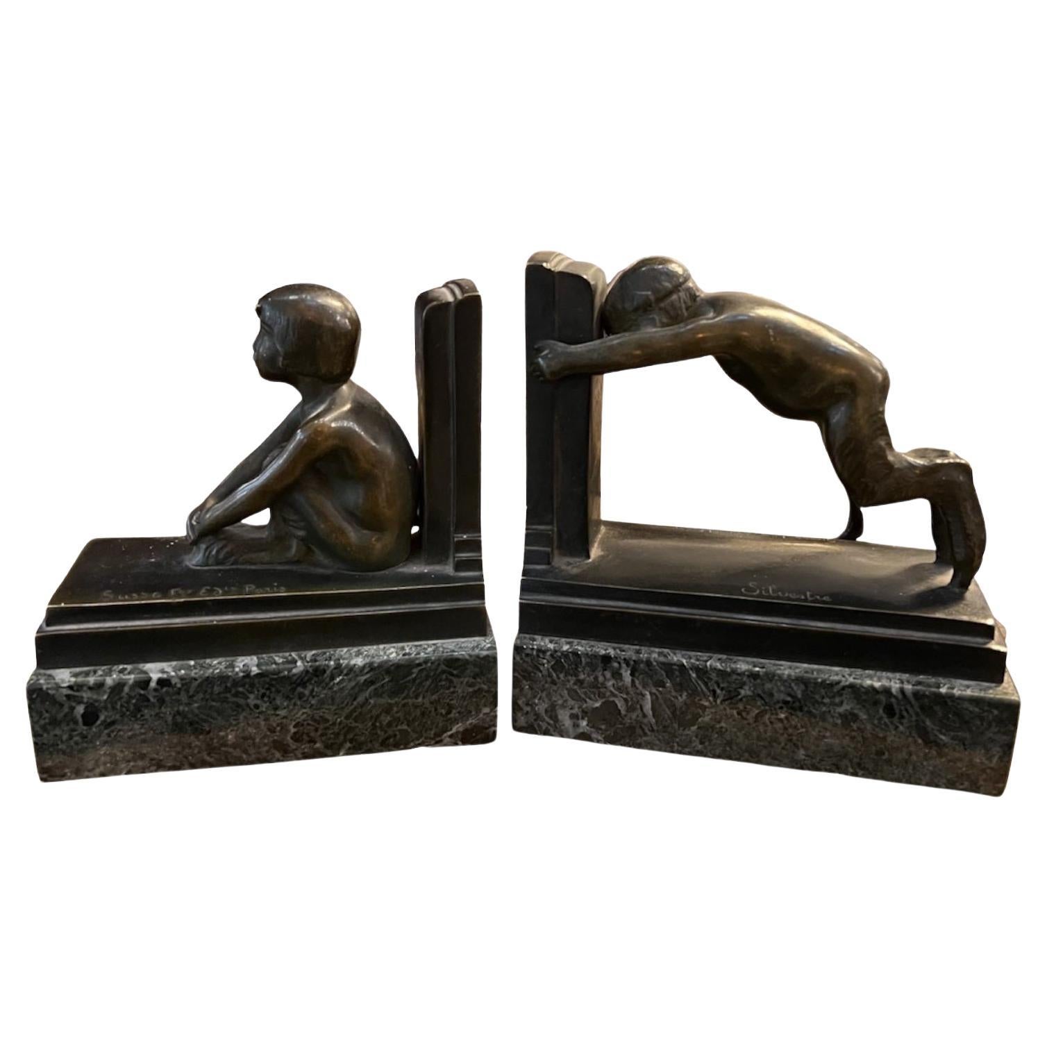 Serre-livres garçons en bronze et marbre, France, style Art déco