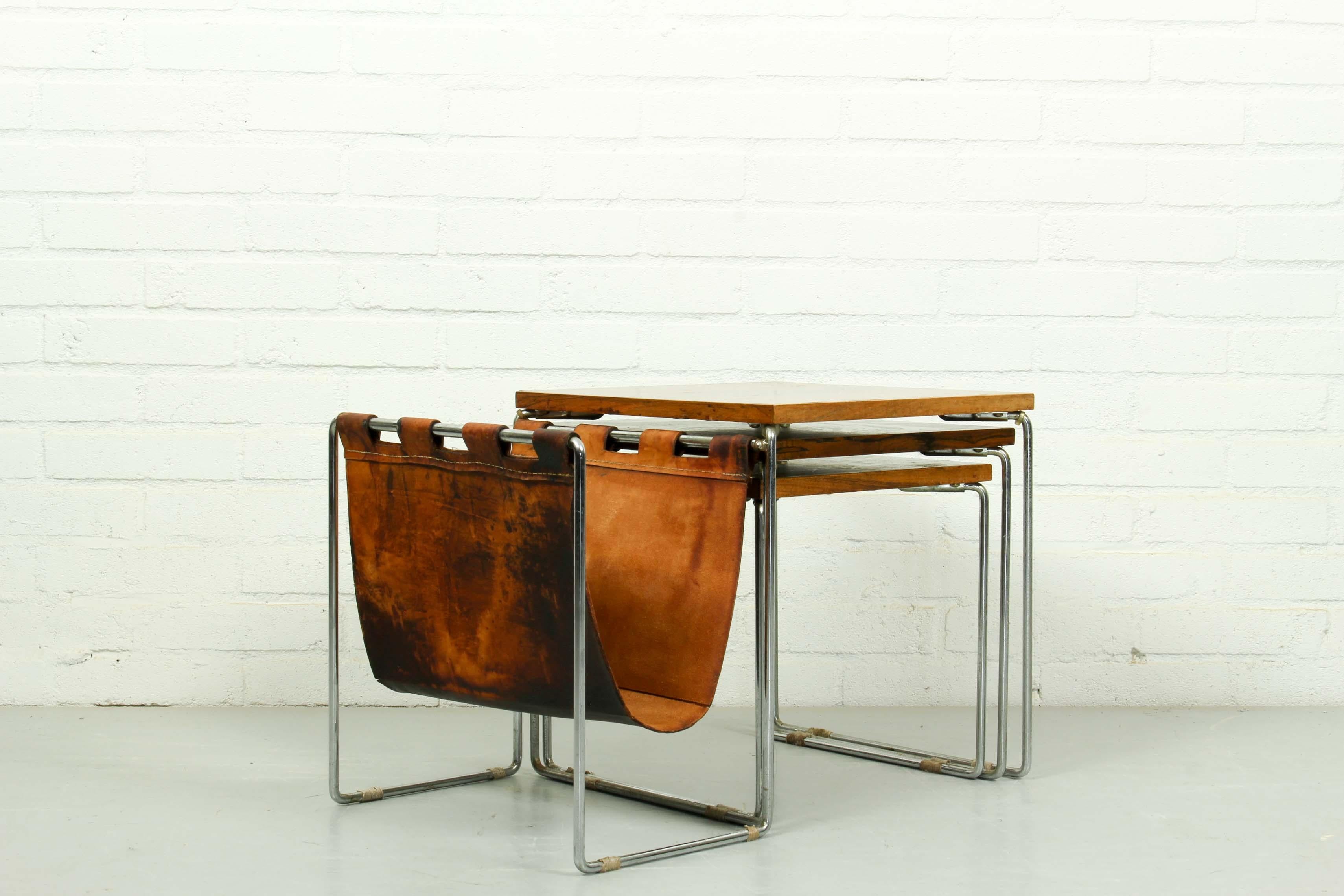 Nesting tables made in the 1970s by Brabantia, The tables are in good vintage condition, the leather has traces of age and use. 

Dimensions in cm: 34.5 x 56 and 37 cm high, 32.5 x 32.5 and 33.5 cm high and 30 x 30 and 30 cm high.
 