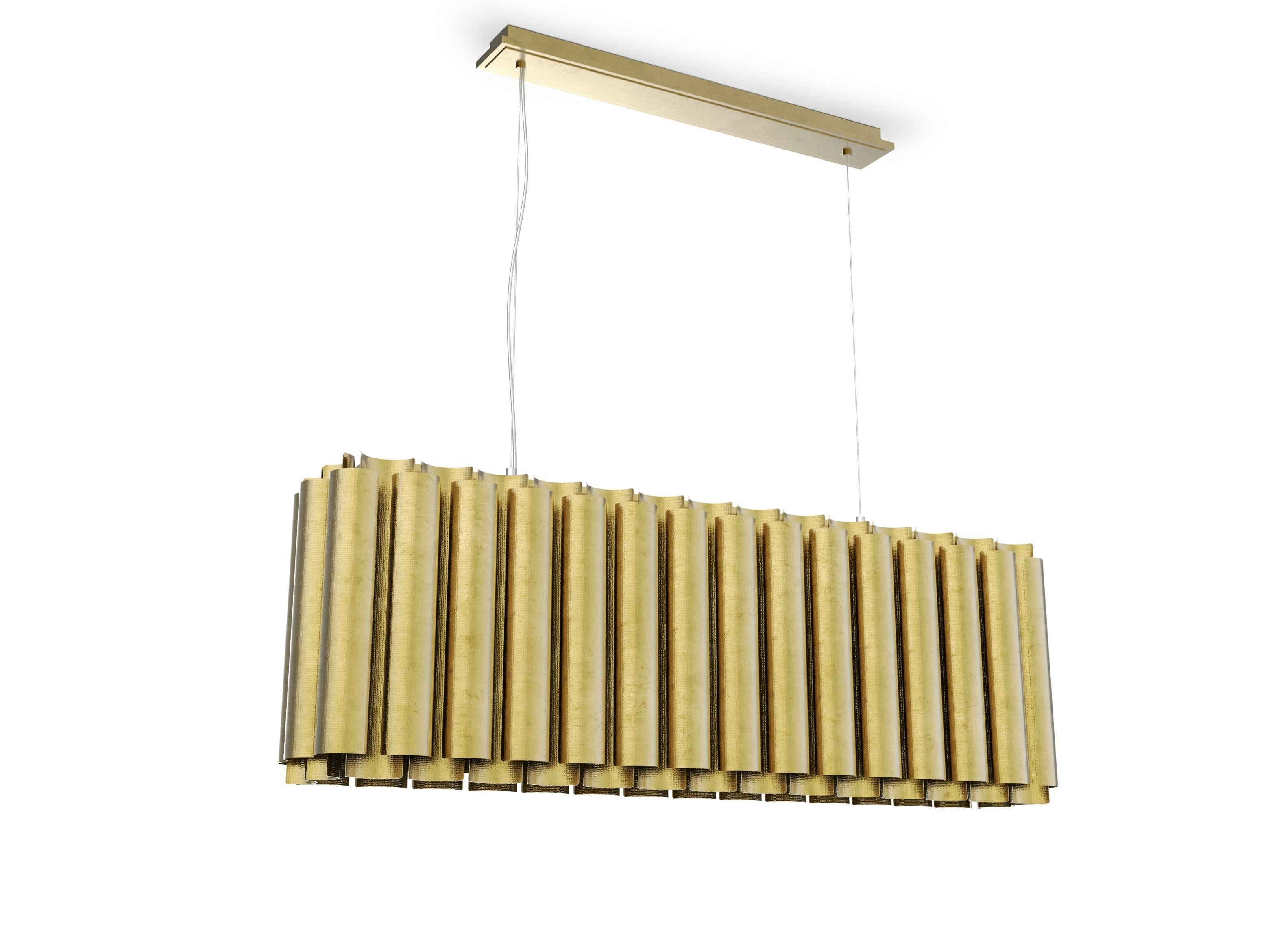 Aurum is the Latin word for gold. This imposing metal also named a contemporary lighting piece made of matte hammered brass. With a unique design, AURUM Suspension Light will bring comfort in the darkest nights with its warm yet sensitive light.