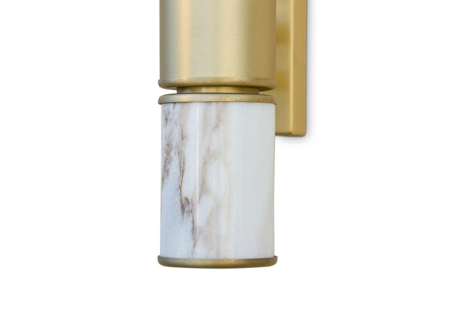 In Ancient Rome, the marble quarries were managed by the Cybo & Malaspina families who ruled over Massa & Carrara. This inspired the creation of CYBO Wall Light. A masterpiece featuring a structure in matte brass & a base in Carrara marble or walnut