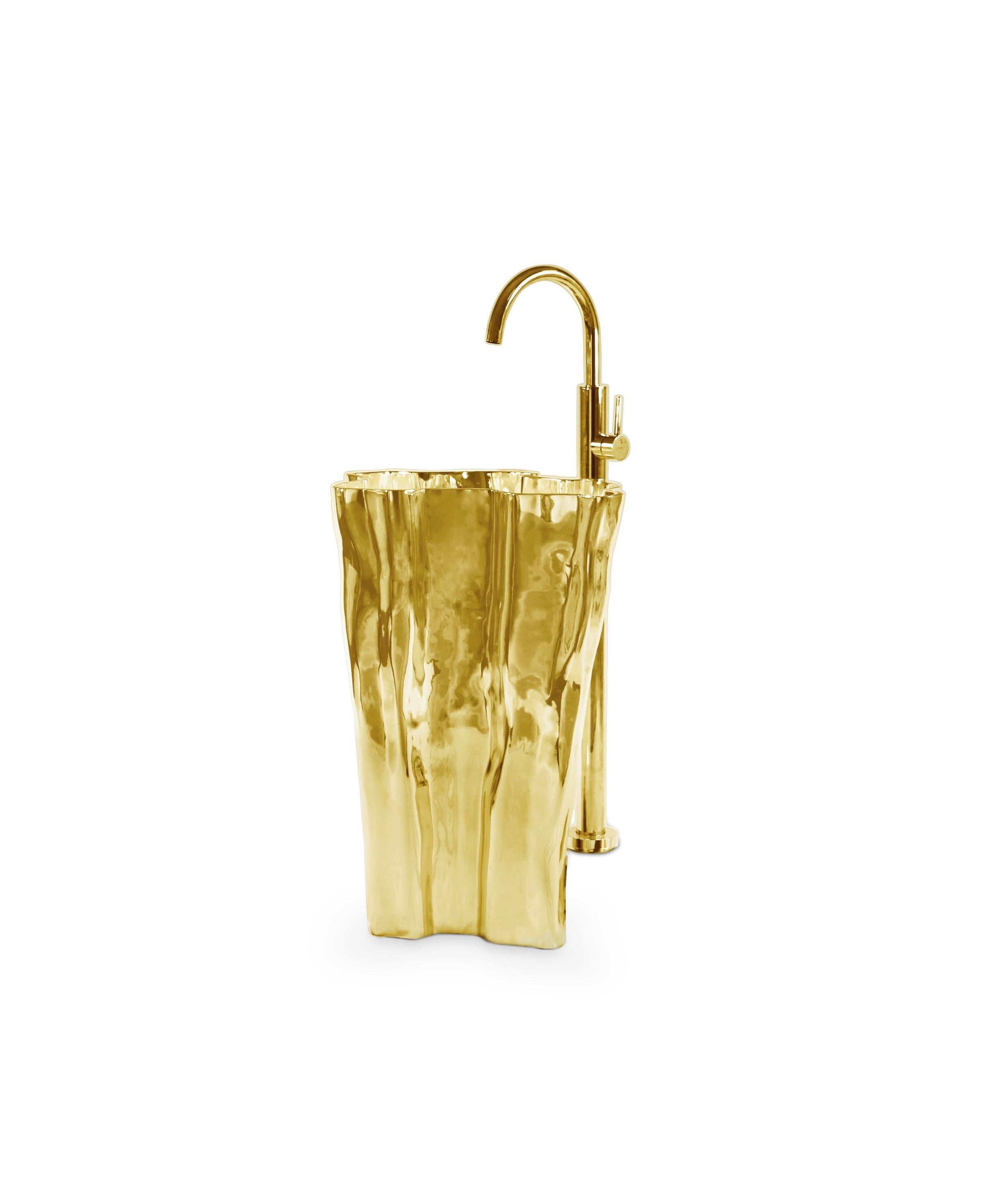 Modern Eden Casted Aluminum Freestanding by Maison Valentina

A Modern Eden Casted Aluminum Freestanding by Maison Valentina, inspired by the shape of a tree stump this frees this washbasin is made of polished casted aluminum in a gold plated color,
