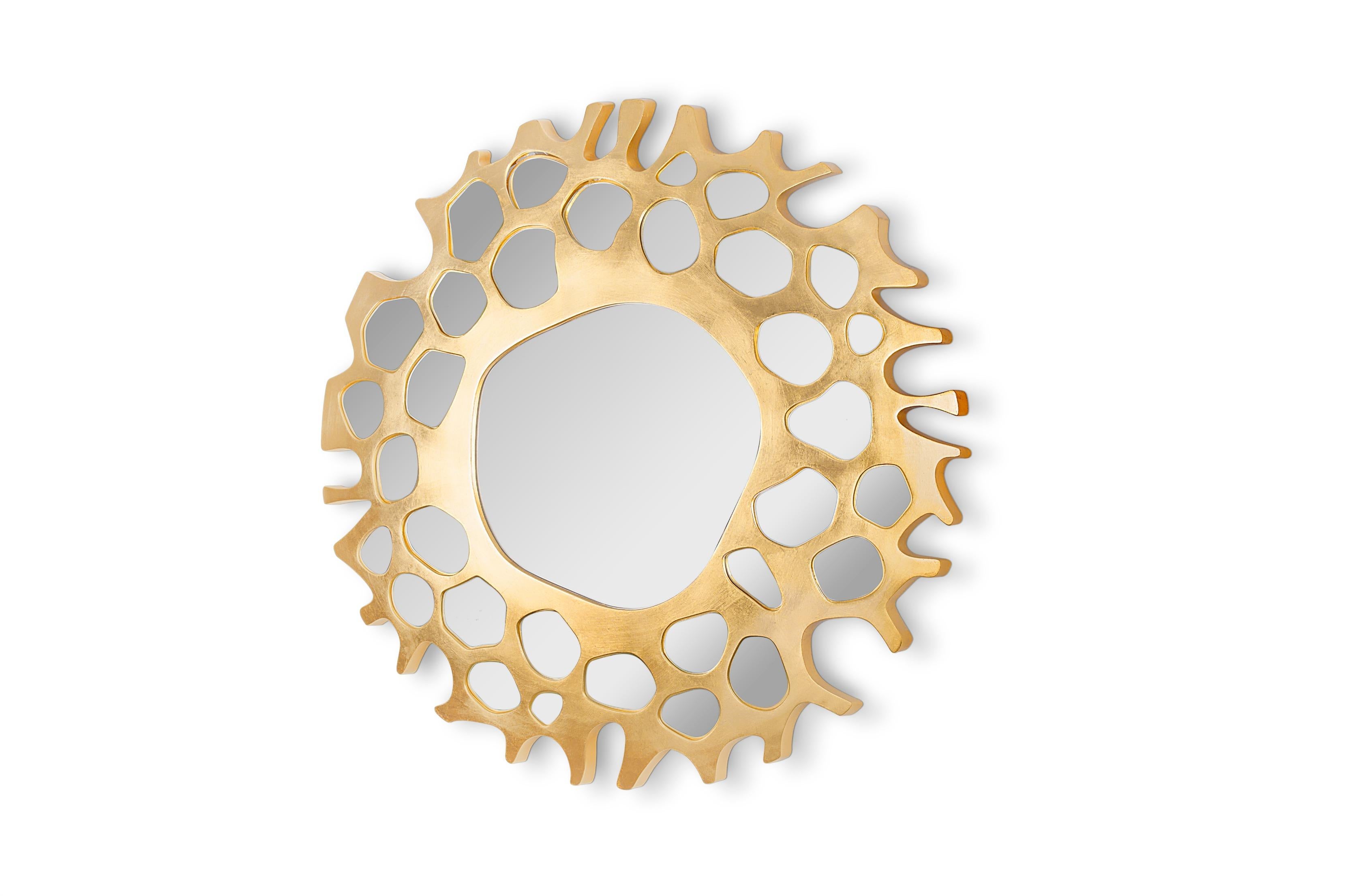 In Greek Mythology, Helios was the personification of the Sun. It is said that each dawn, he rose from the far ends of the earth with the shining aureole of the Sun. This inspired the creation of Helios mirror. With a finish in golden leaf, this