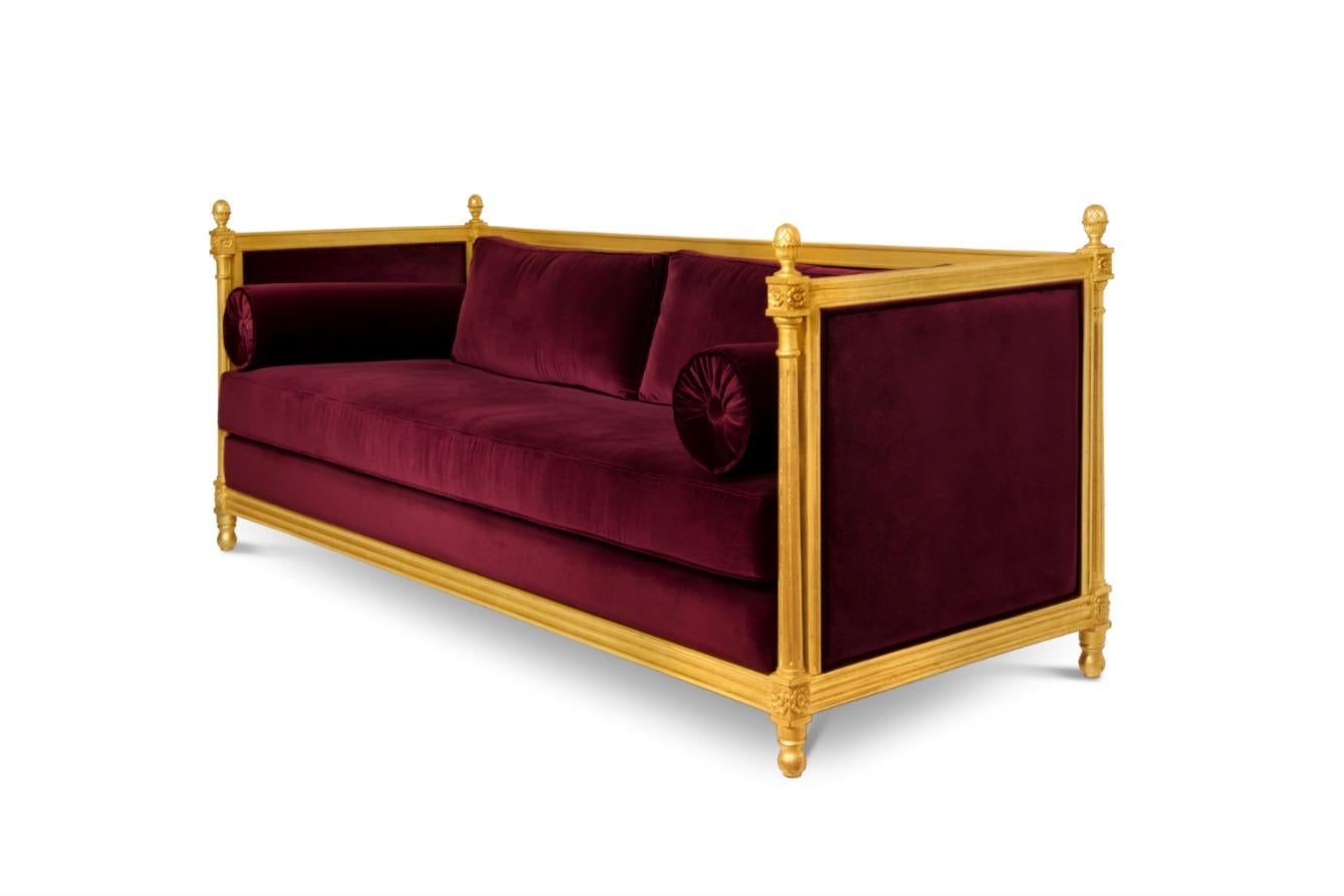 Malkiy sofa was named after a king and priest mentioned in the Book of Genesis whose name means justice and king of righteousness. This tuxedo sofa is upholstered in cotton velvet and has legs in aged golden leaf, promising to make an alluring