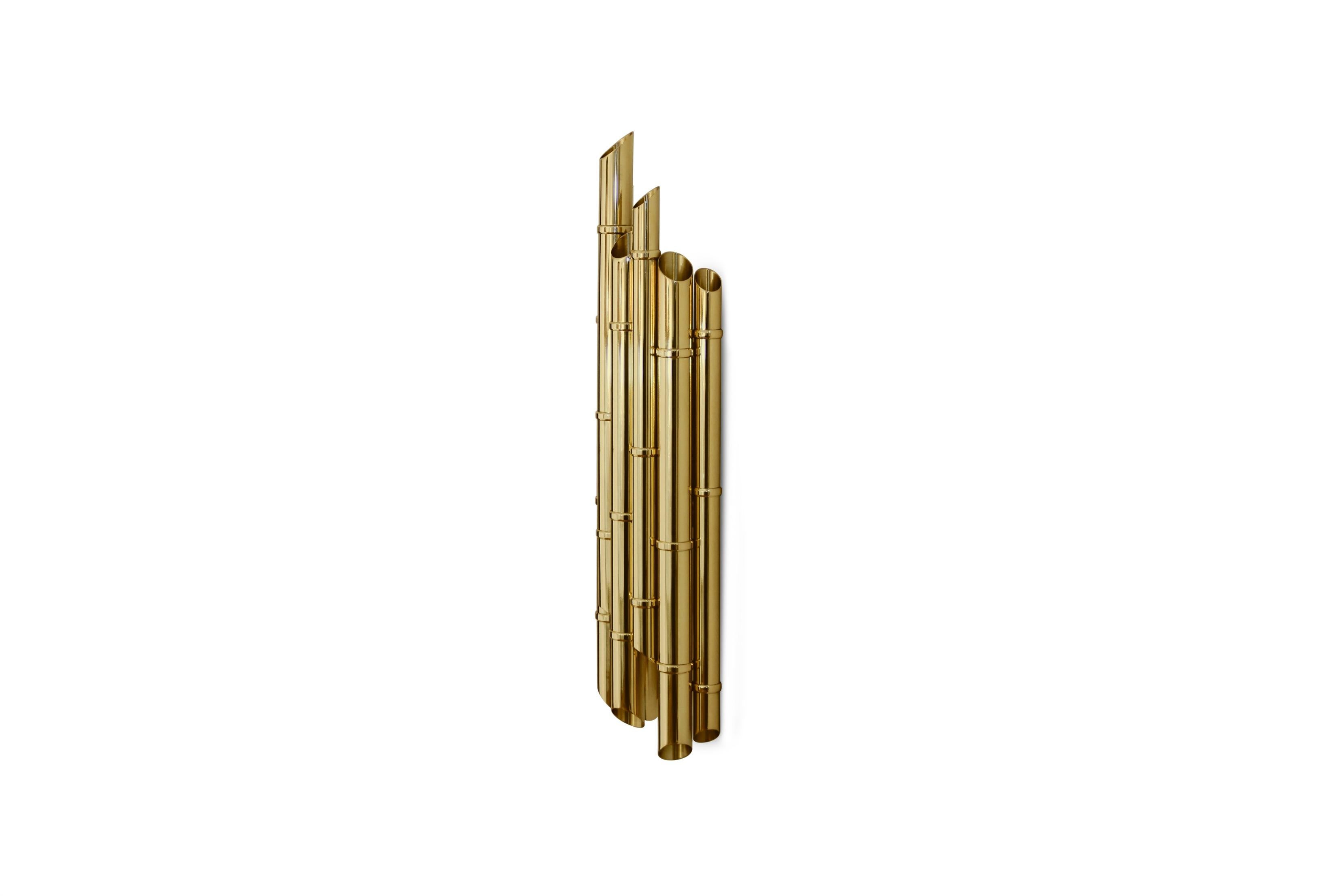 Located in Japan, Sakishima Islands are part of Ryukyu Islands chain. Saki wall Light is a tribute to this unforgettable island group. This gold plated brass sconce is a remarkable lighting piece that will create a warm and cozy modern interior