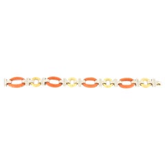 Yellow gold, white gold, diamond and orange oval soft link bracelet