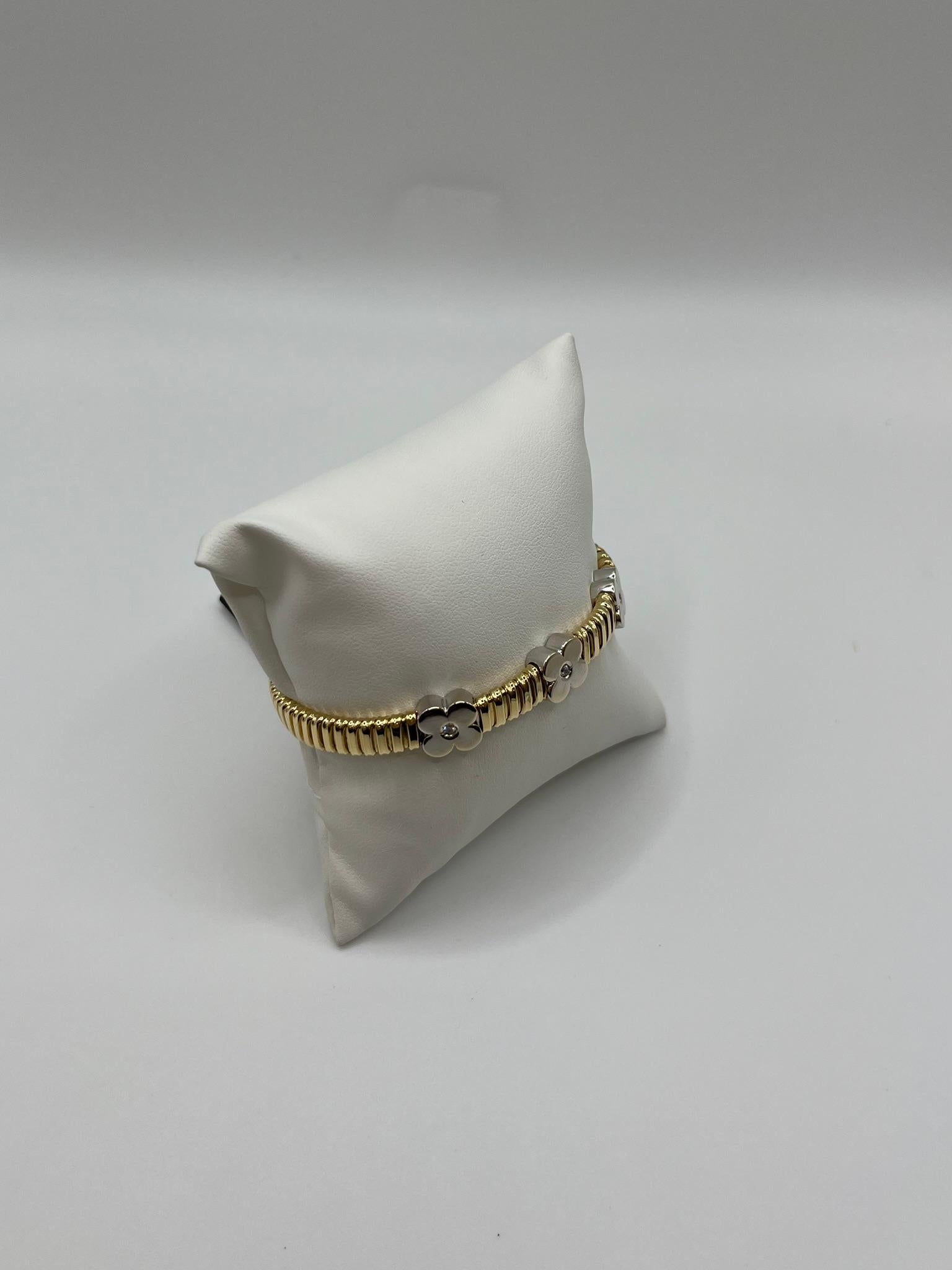 Pulsera Tubogas de oro amarillo y blanco de 18 quilates con diamantes Corte brillante en venta