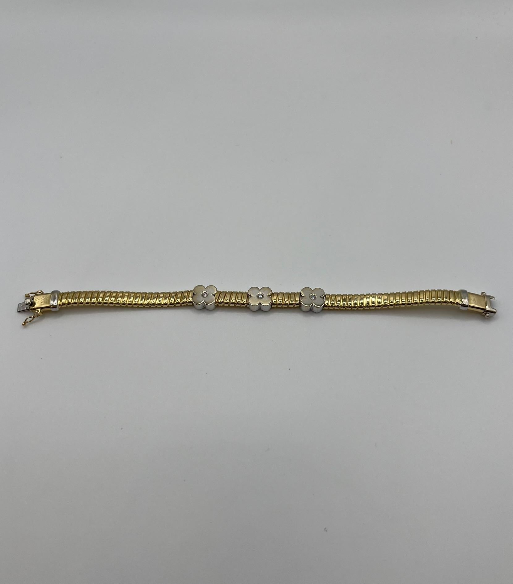 Pulsera Tubogas de oro amarillo y blanco de 18 quilates con diamantes en venta 1