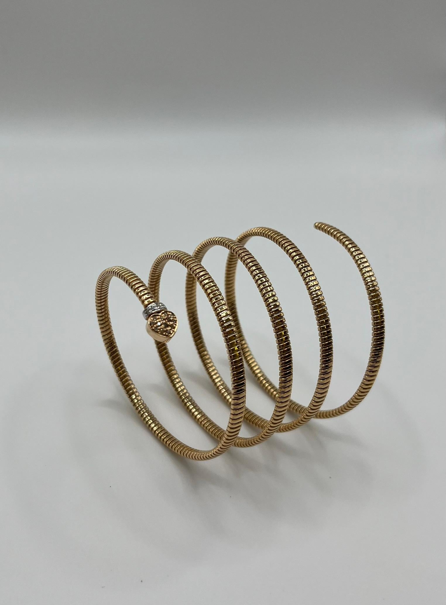 Elegantes Fidia Gioielli 5-Spiral-Schlangenarmband, hergestellt in anspruchsvoller Tubogas-Verarbeitung, das sich mit fließenden, modernen Linien um das Handgelenk wickelt. Dieses Schmuckstück wurde in Florenz, Italien, entworfen und handgefertigt.