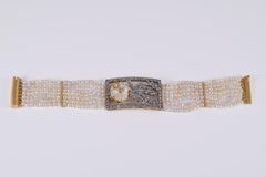 18k gold and 14k silver bracelet with freshwater pearls and Diamonds