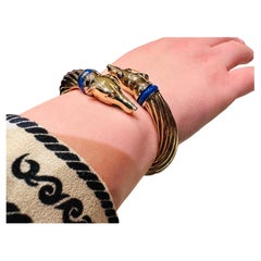 Bracelet en or jaune 18 carats avec têtes de lévriers - Symbole d'élégance et de force