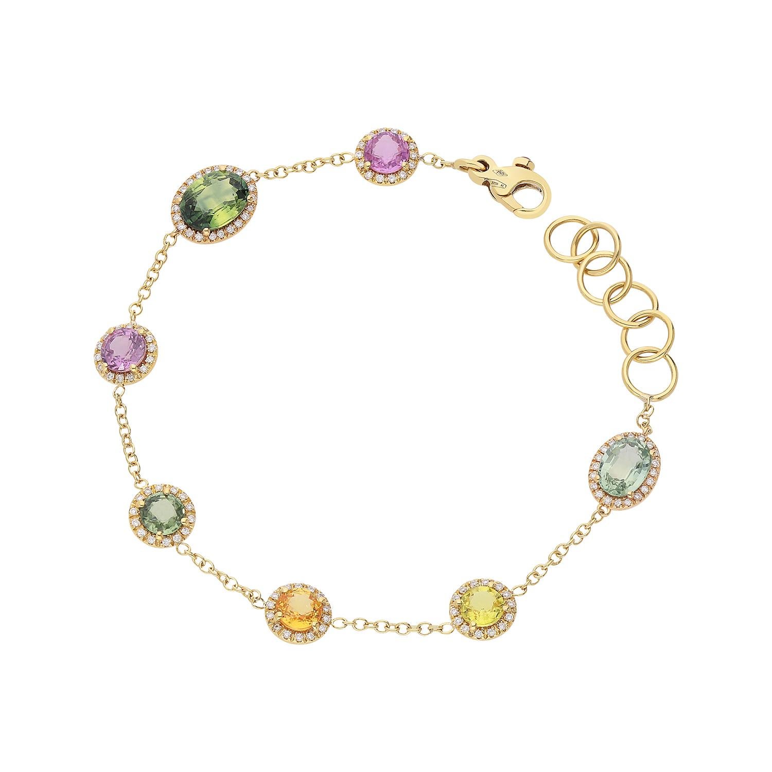 An elegant 18kt yellow gold bracelet with a total weight of 4.80 composed of a chain with equally spaced elements. Each element consists of a multi-color round- or oval-cut sapphire surrounded by brilliant-cut diamonds, color G SI clarity. Sapphires