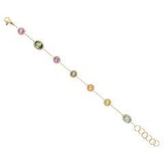 Bracelet en or jaune 18 carats avec diamants blancs et saphirs multicolores