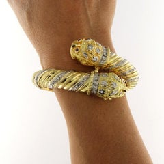 Bracciale rigido in oro giallo con diamanti e rubini