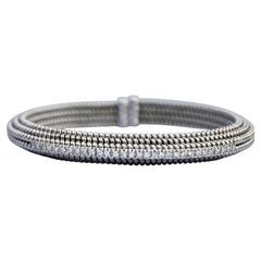 Pulsera rígida de oro blanco de 18 quilates y diamantes
