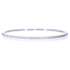 Bracelet semi-rigide avec diamants ct 0.64 en or blanc 18 carats