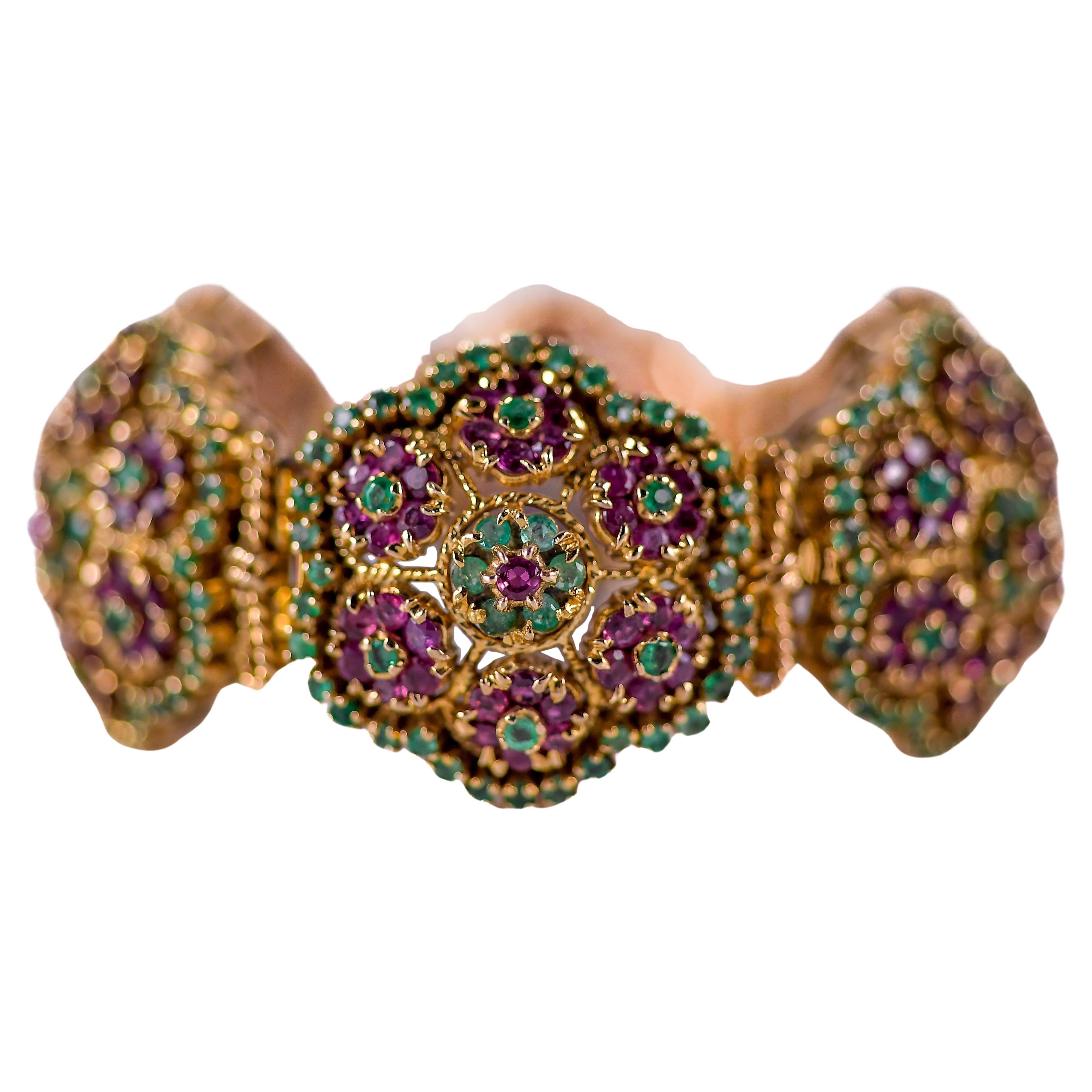 Bracciale semi rigido con zaffiri rosa e smeraldi im Angebot