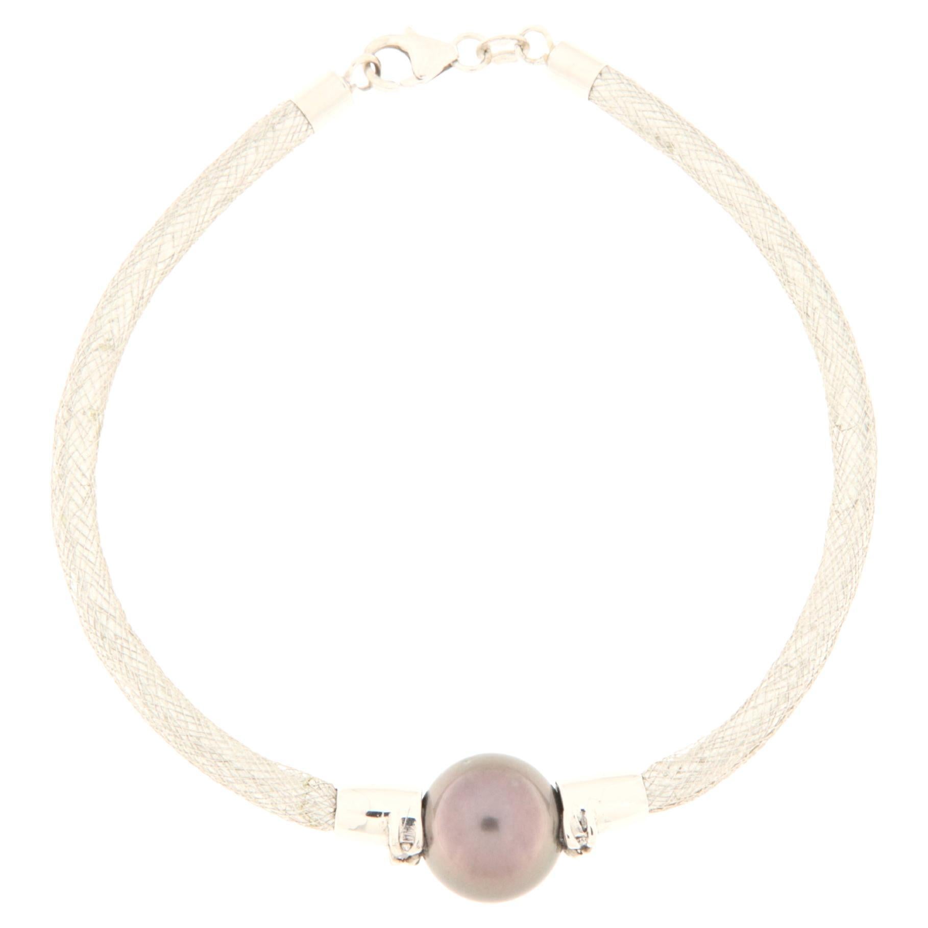Bracelet semi-rigide en or blanc avec diamants et perle grise  en vente