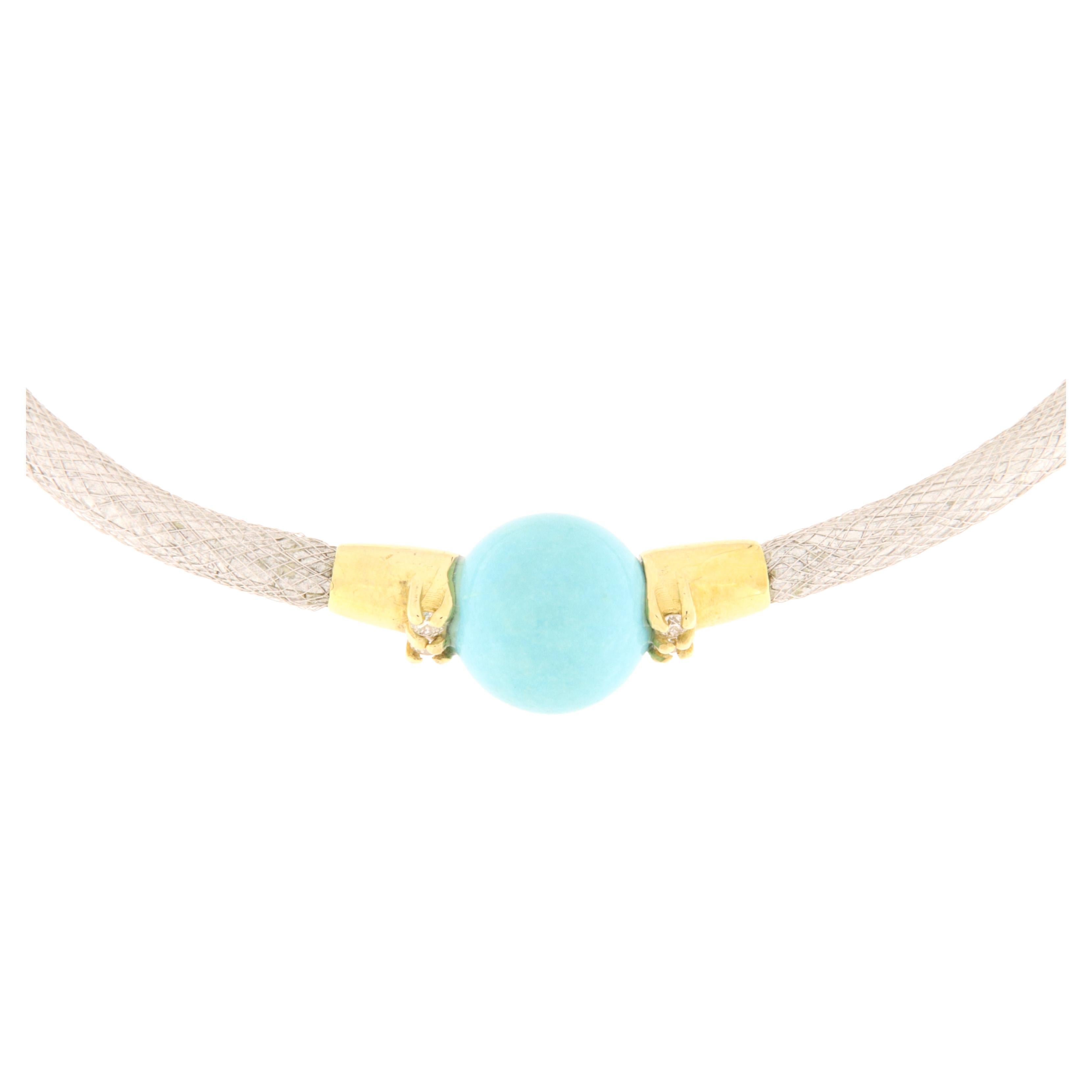 Handmade bracelet with white gold stocking link, yellow gold frame and clasp. Mounted in the center is a turquoise ball with four side rhinestones. The model is also available with a central gray pearl and in yellow gold with gold pearl.