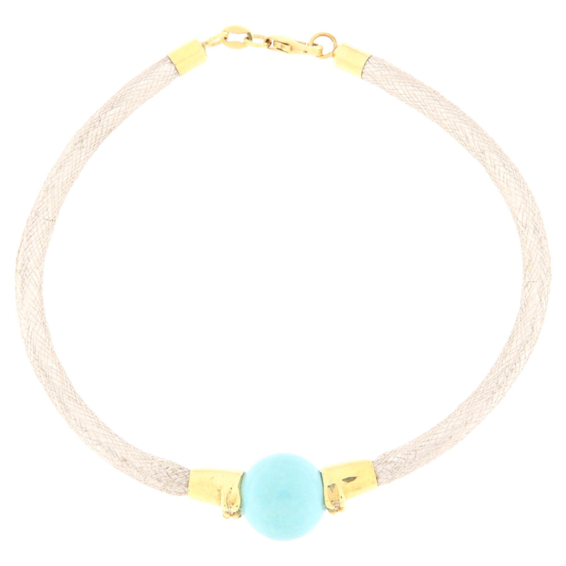 White gold semirigid bracelet with diamonds and turquoise sphere