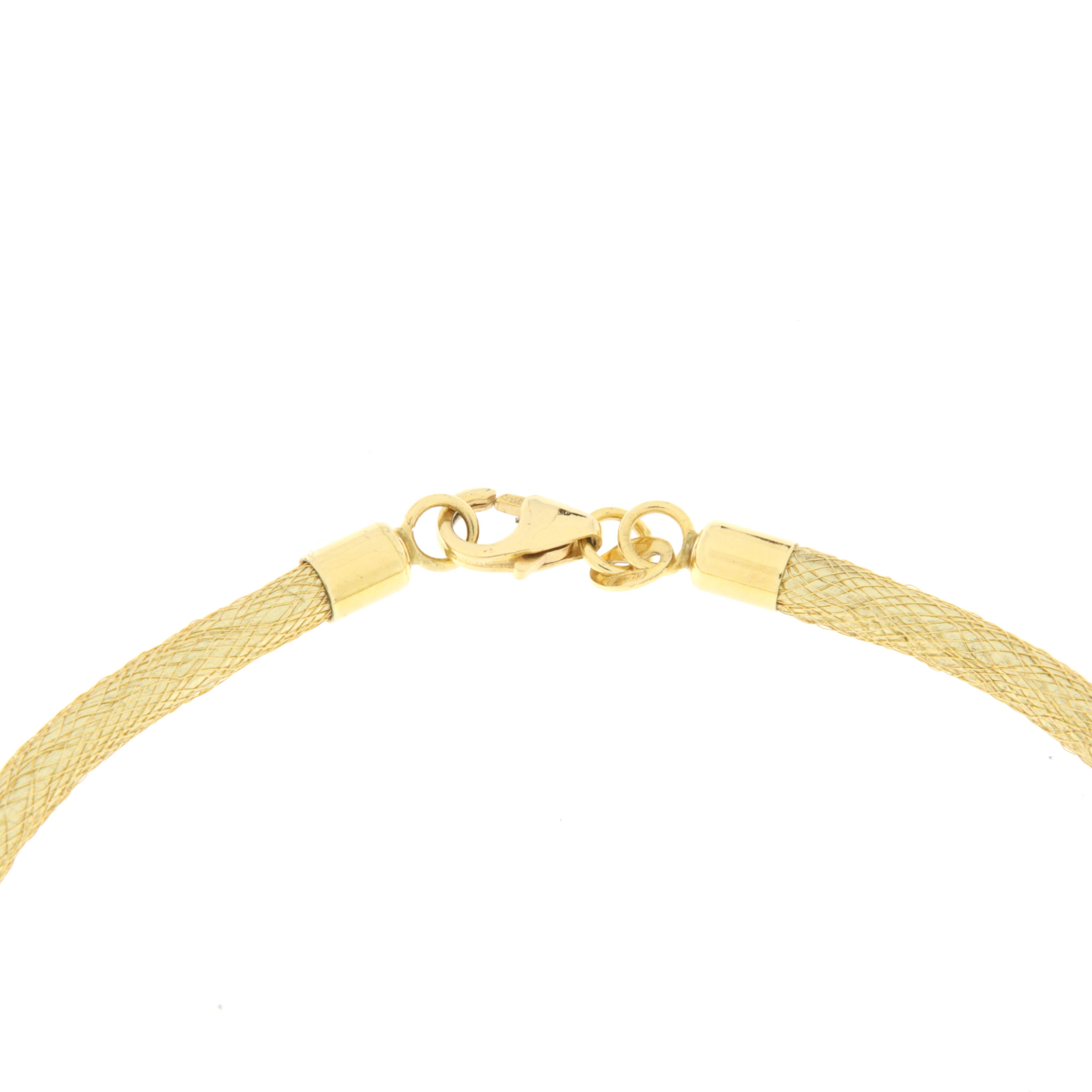 Modern Yellow gold semirigid bracelet with diamonds and gold pearl For Sale