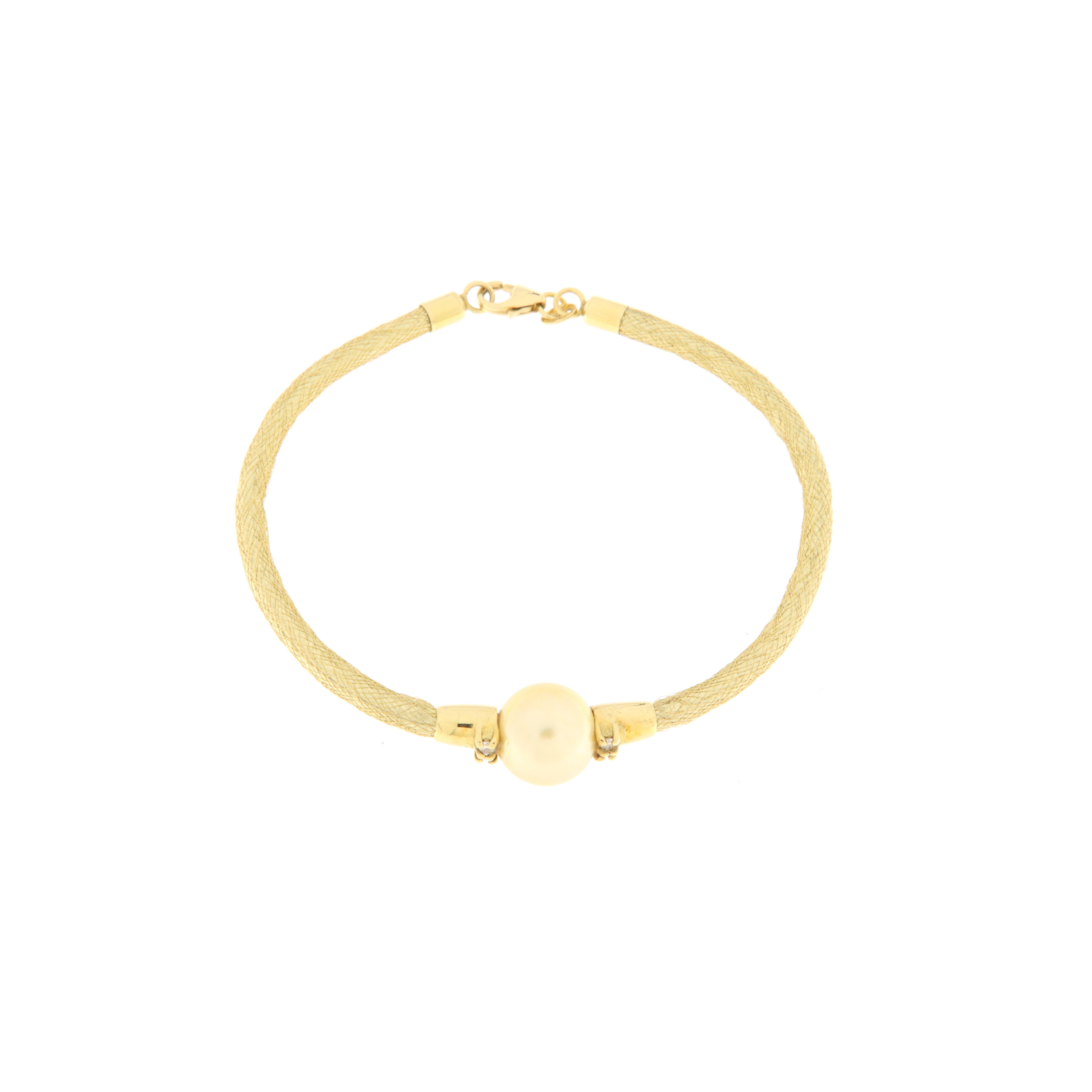 Brilliant Cut Yellow gold semirigid bracelet with diamonds and gold pearl For Sale