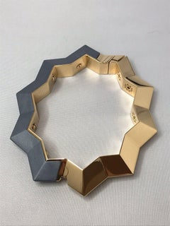 "Stella Chrysler" bracelet in 18kt yellow gold and Chrysler Aluminum