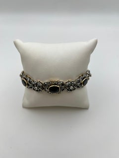 Vintage gold and silver bracelet with 21-carat diamonds and sapphires