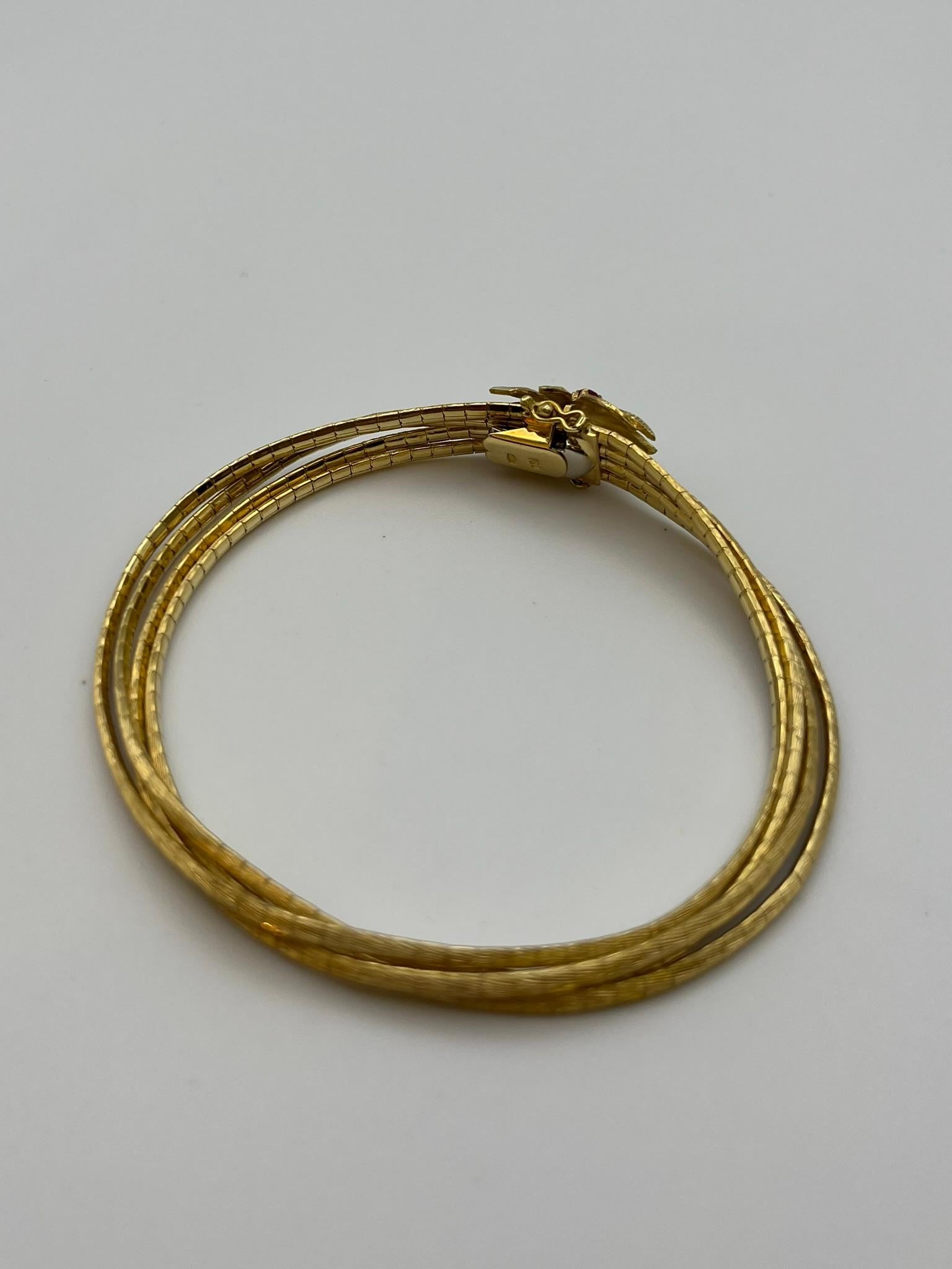 Donna Bracciale vintage multifilo in oro giallo 18 kt. con rubini in vendita